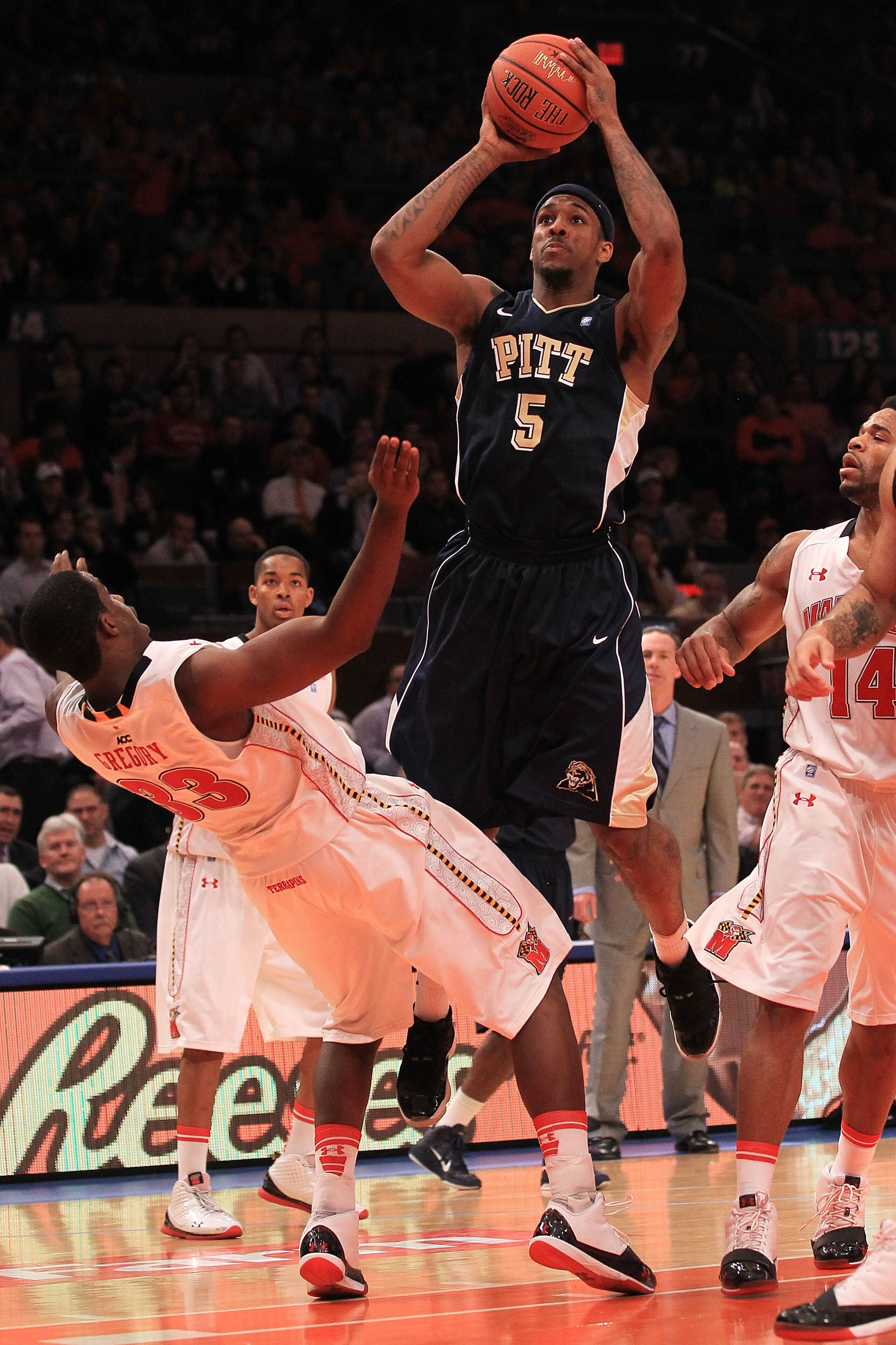 NEW YORK - NOVEMBER 18:  Gilbert Brown #5 of the Pittsburgh Panthers charges into Dino Gregory #33 of the Maryland Terrapins during the 2k Sports Classic at Madison Square Garden on November 18, 2010 in New York, New York.  (Photo by Chris McGrath/Getty I