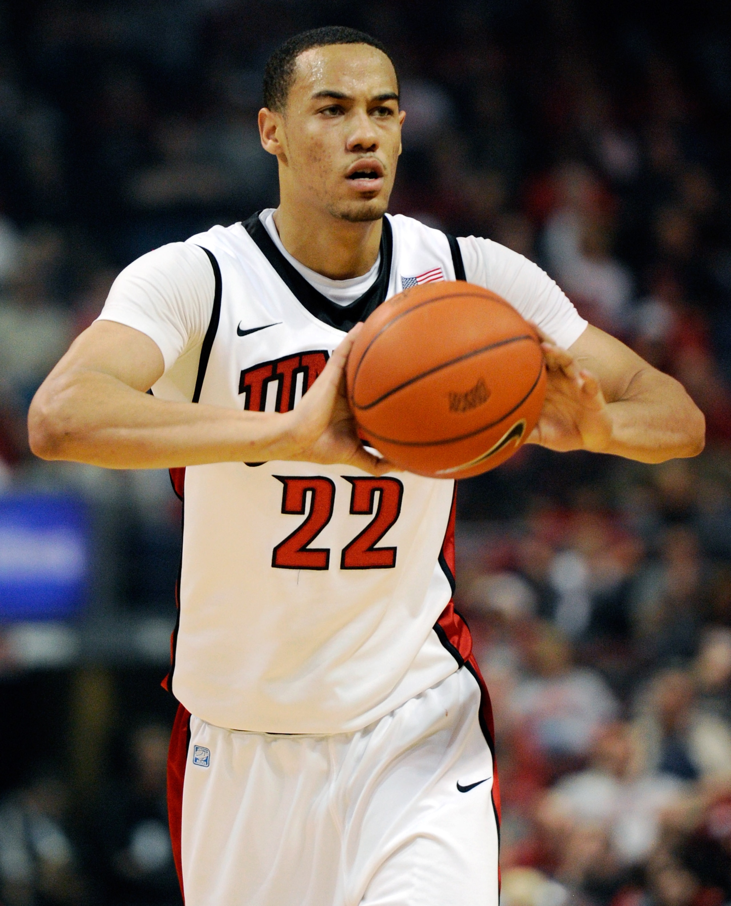 LAS VEGAS, NV - DECEMBER 08:  Chace Stanback #22 of the UNLV Rebels looks to pass against the Boise State Broncos during their game at The Orleans Arena December 8, 2010 in Las Vegas, Nevada. UNLV won 75-72.  (Photo by Ethan Miller/Getty Images)