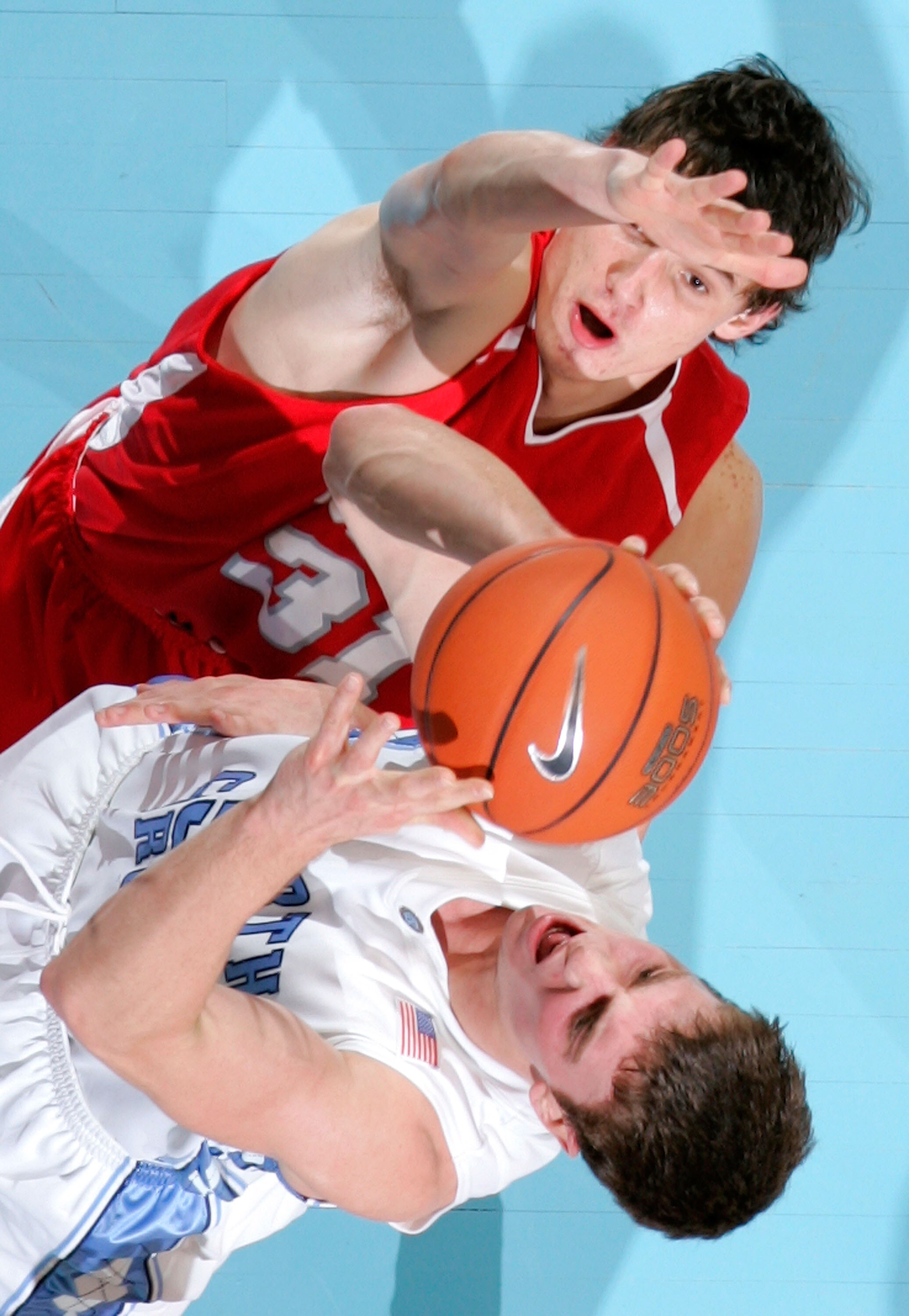 CHAPEL HILL, NC - DECEMBER 19:  Tyler Hansbrough #50 of the North Carolina Tar Heels shoots over Anatoly Bose #31 of the Nicholls State Colonels during the second half at the Dean E. Smith Center on December 19, 2007 in Chapel Hill, North Carolina.  North