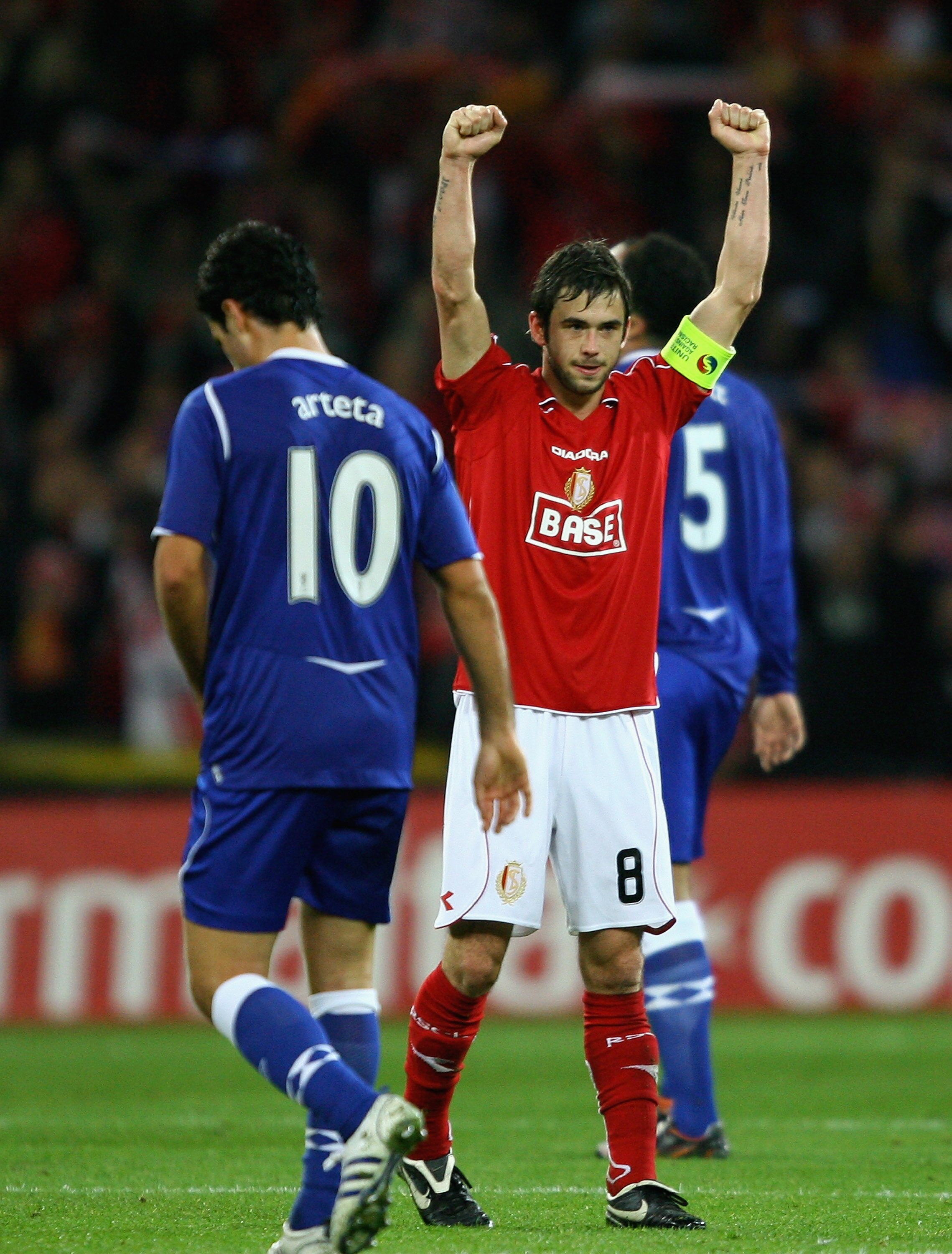 LIEGE, BELGIUM - OCTOBER 02:  Steven Defour of Standard Liege celebrates on the final whistle after victory in the UEFA Cup first round, second leg match, between Standard Liege and Everton at Stade Maurice Dufrasne, on October 2, 2008 in Liege,Belgium.