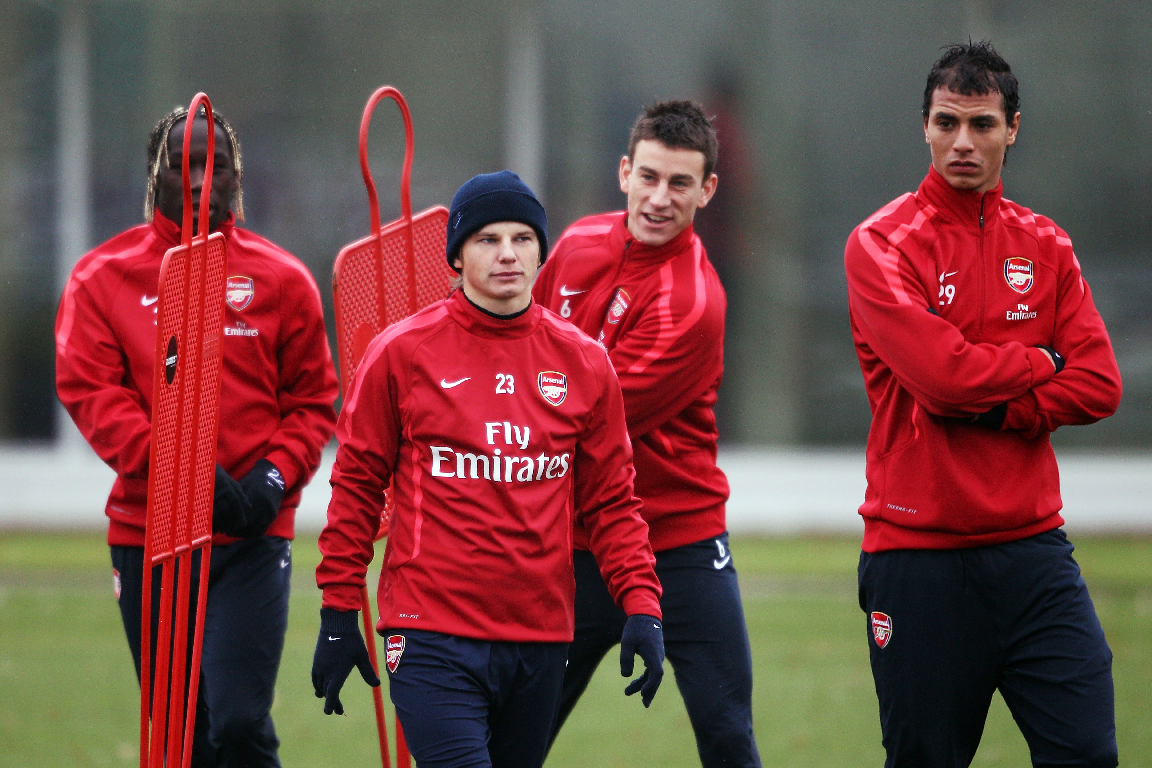 ST ALBANS, ENGLAND - DECEMBER 15:  (L-R)  Bacary Sagna, Andrei Arshavin, Laurent Koscielny and Marouane Chamakh walk out to the Arsenal Training Session at London Colney on December 15, 2010 in St Albans, England.  (Photo by Dean Mouhtaropoulos/Getty Imag