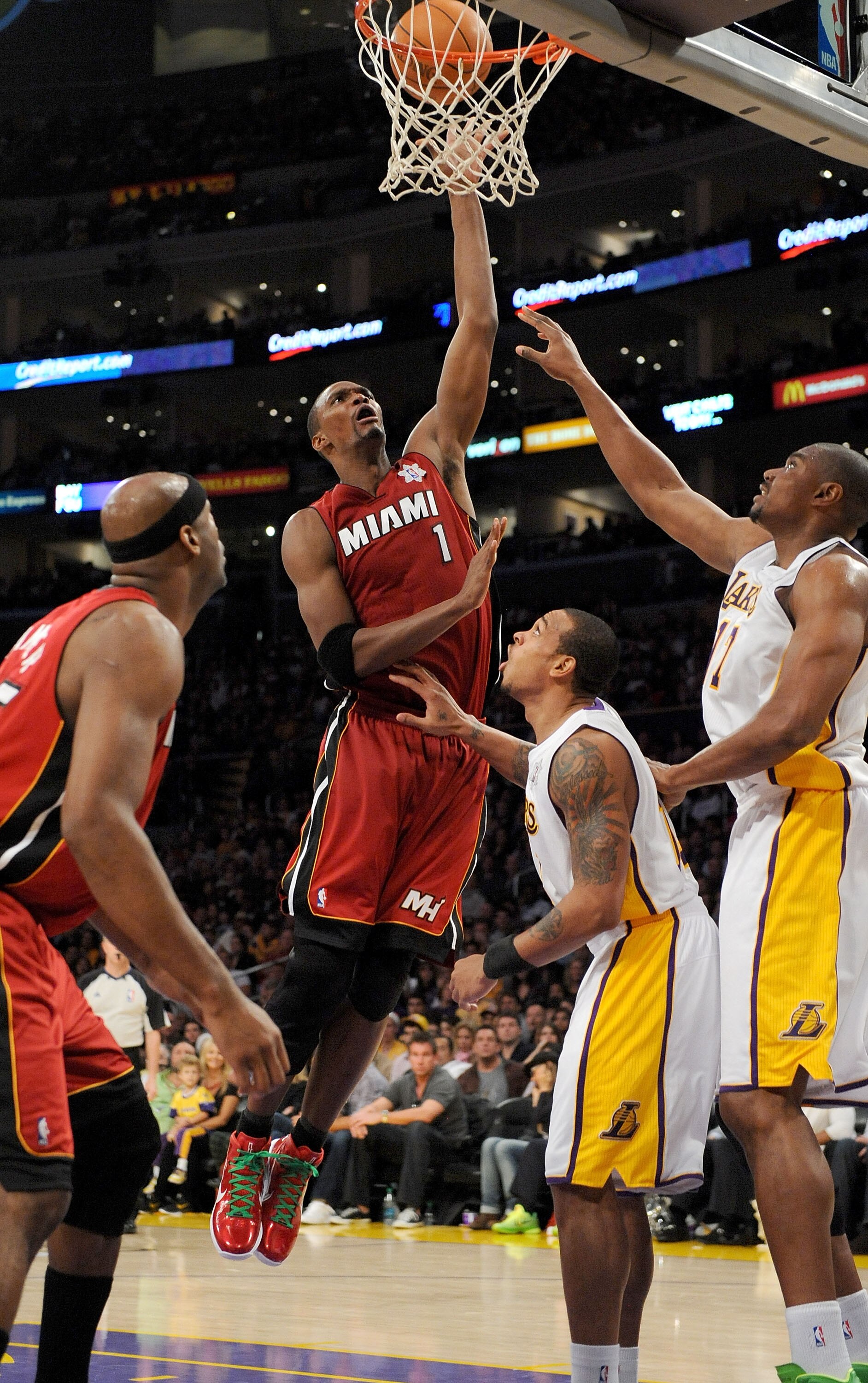 LOS ANGELES, CA - DECEMBER 25:  Chris Bosh #1 of the Miami Heat puts a shot up against the Los Angeles Lakers at Staples Center on December 25, 2010 in Los Angeles, California. NOTE TO USER: User expressly acknowledges and agrees that, by downloading and