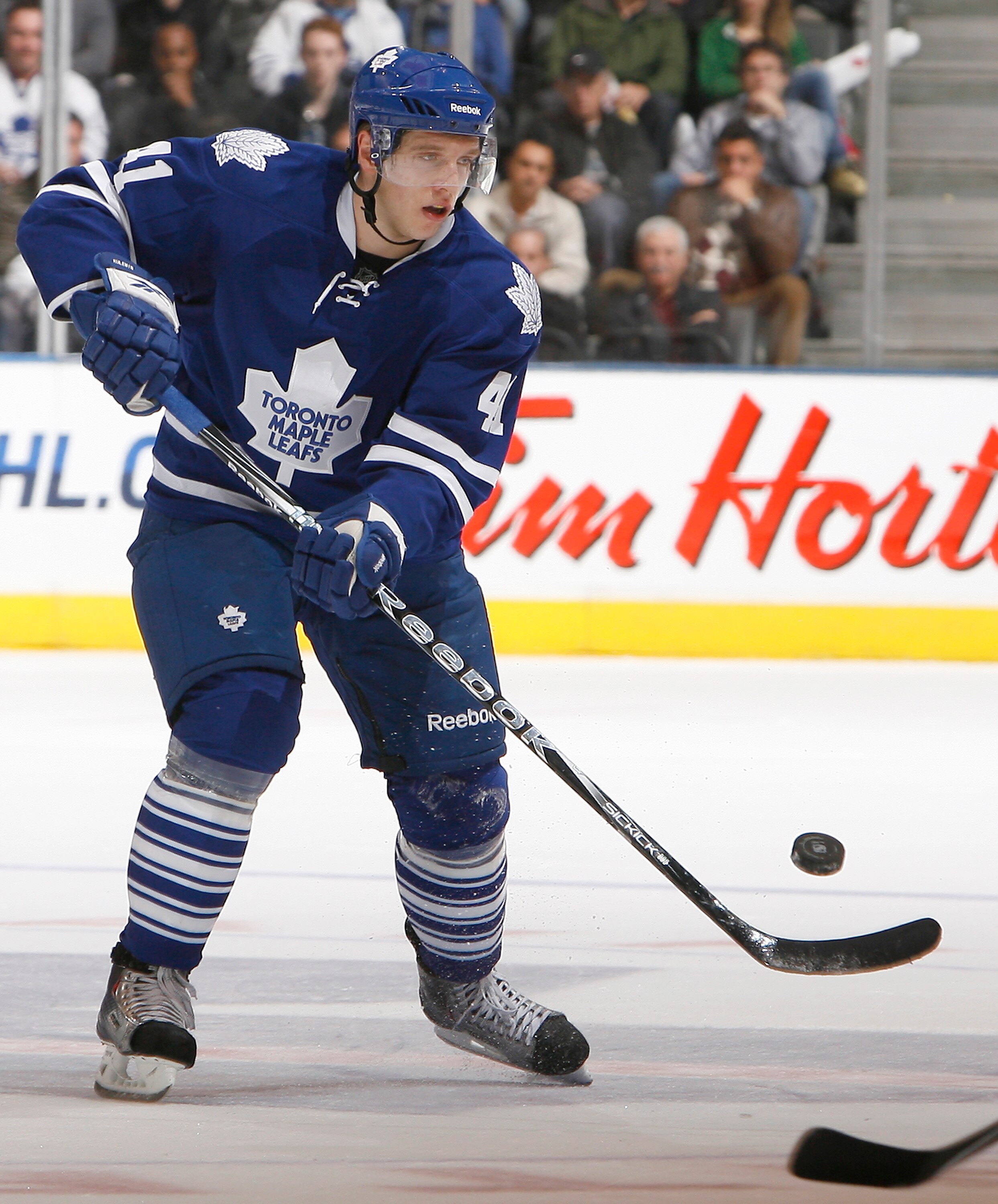 TORONTO - OCTOBER 26: Nikolai Kulemin #41 of the Toronto Maple Leafs carries the puck against the Florida Panthers during game action at the Air Canada Centre October 26, 2010 in Toronto, Ontario, Canada. The Leafs won 3-1. (Photo by Abelimages/Getty Imag