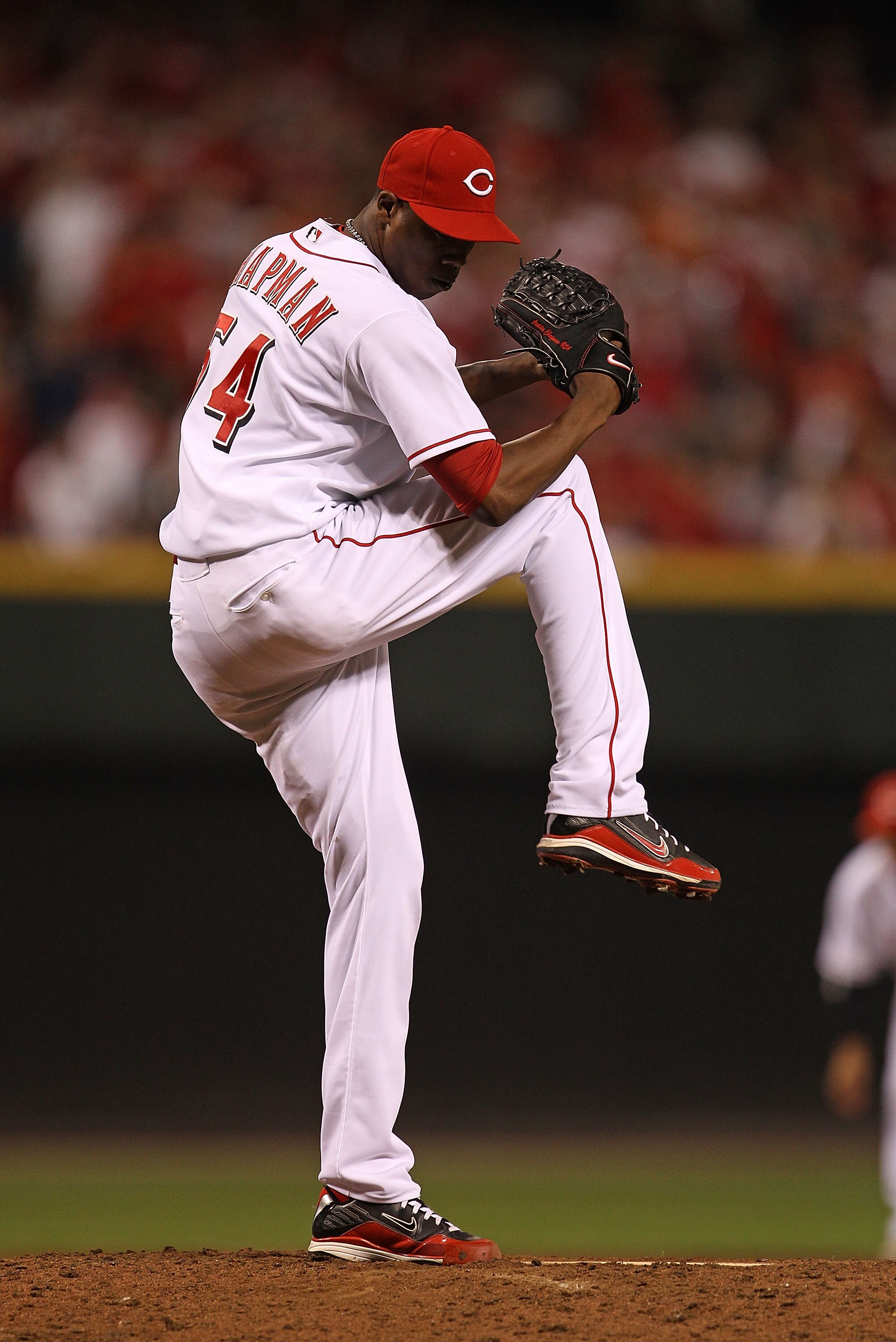 CINCINNATI - OCTOBER 10: Aroldis Chapman #54 of the Cincinnati Reds pitches in the 9th inning against the Philadelphia Phillies during game 3 of the NLDS at Great American Ball Park on October 10, 2010 in Cincinnati, Ohio. The Phillies defeated the Reds 2