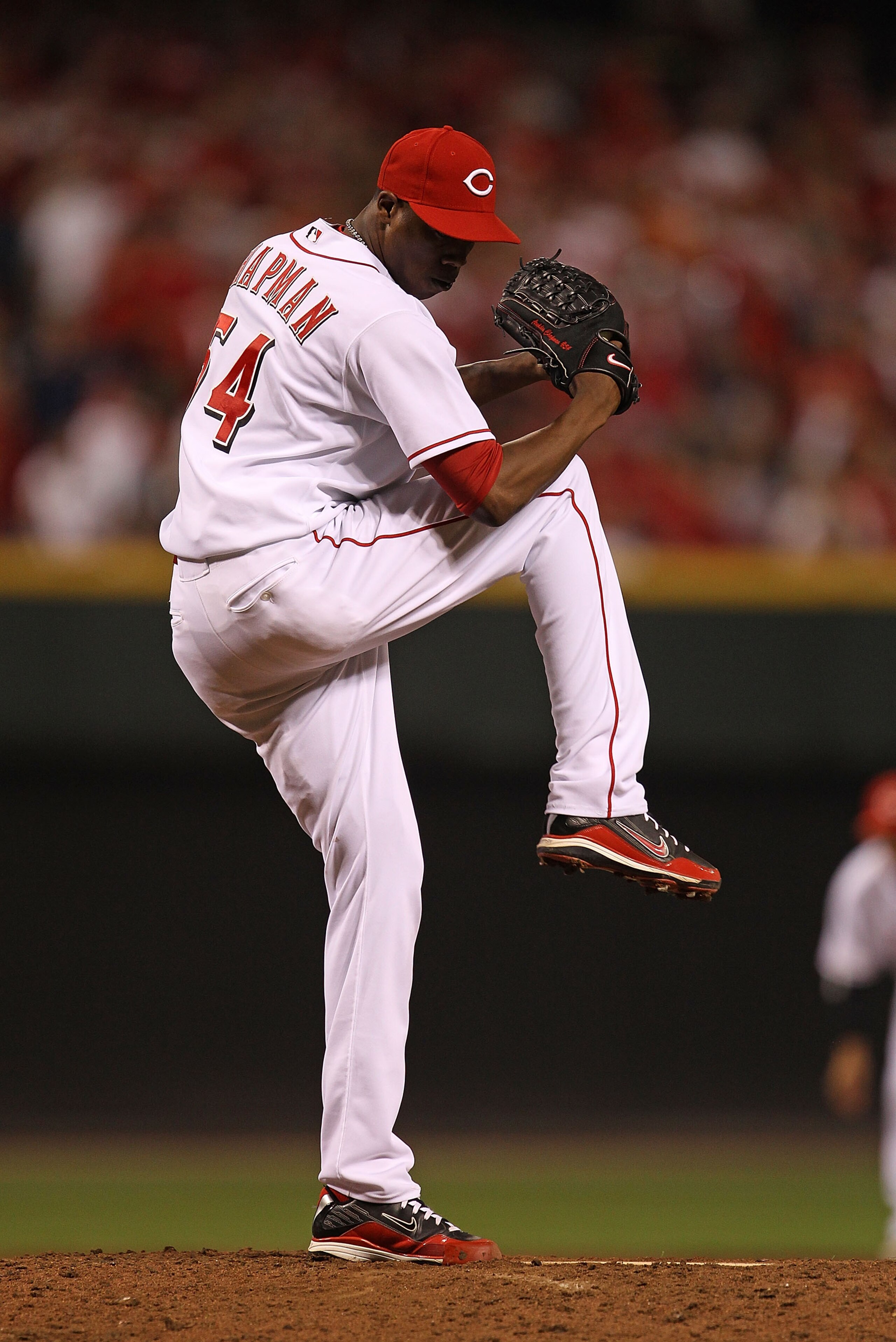 CINCINNATI - OCTOBER 10: Aroldis Chapman #54 of the Cincinnati Reds pitches in the 9th inning against the Philadelphia Phillies during game 3 of the NLDS at Great American Ball Park on October 10, 2010 in Cincinnati, Ohio. The Phillies defeated the Reds 2