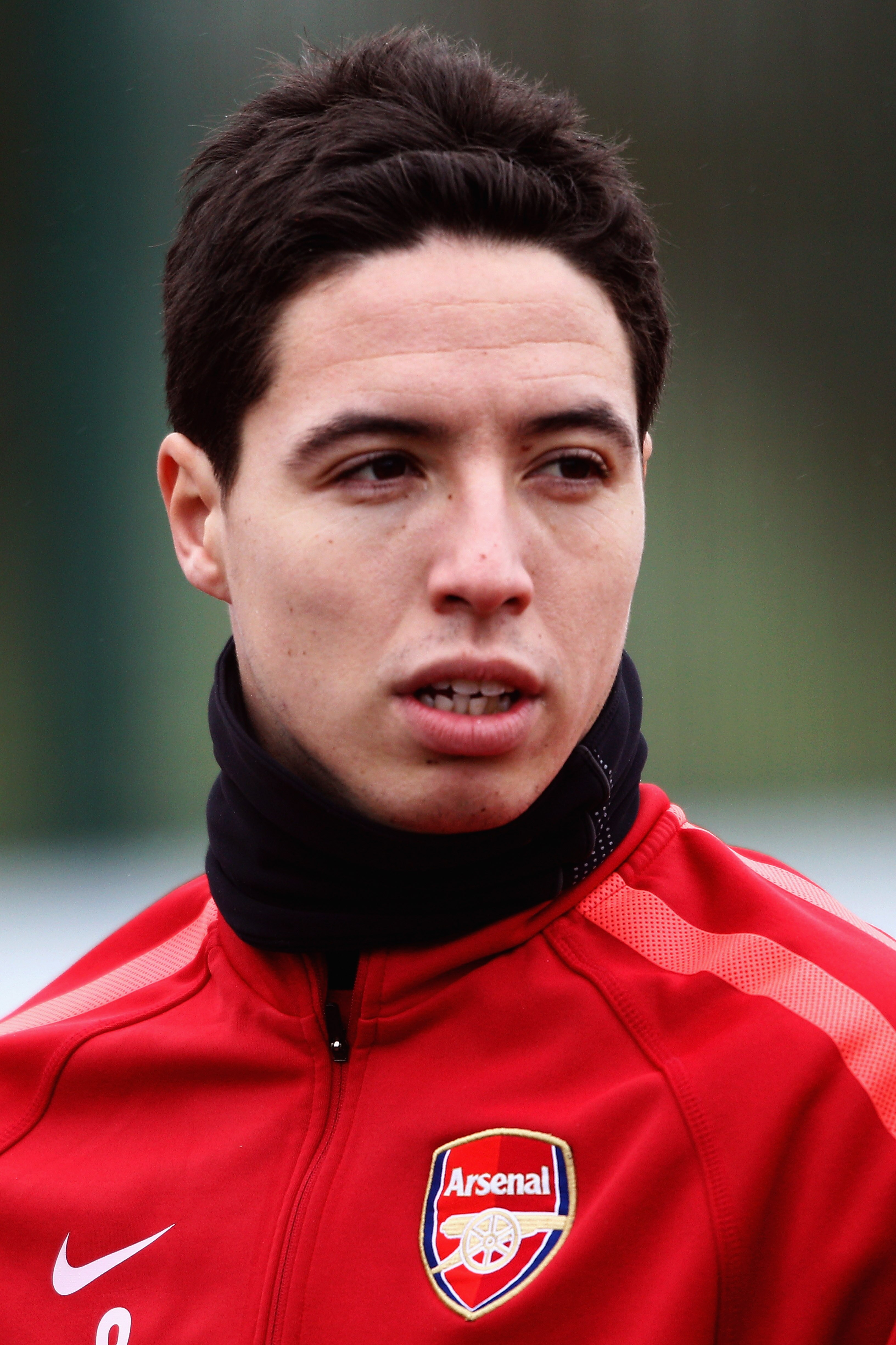 ST ALBANS, ENGLAND - DECEMBER 15:  Samir Nasri looks on during the Arsenal Training Session at London Colney on December 15, 2010 in St Albans, England.  (Photo by Dean Mouhtaropoulos/Getty Images)
