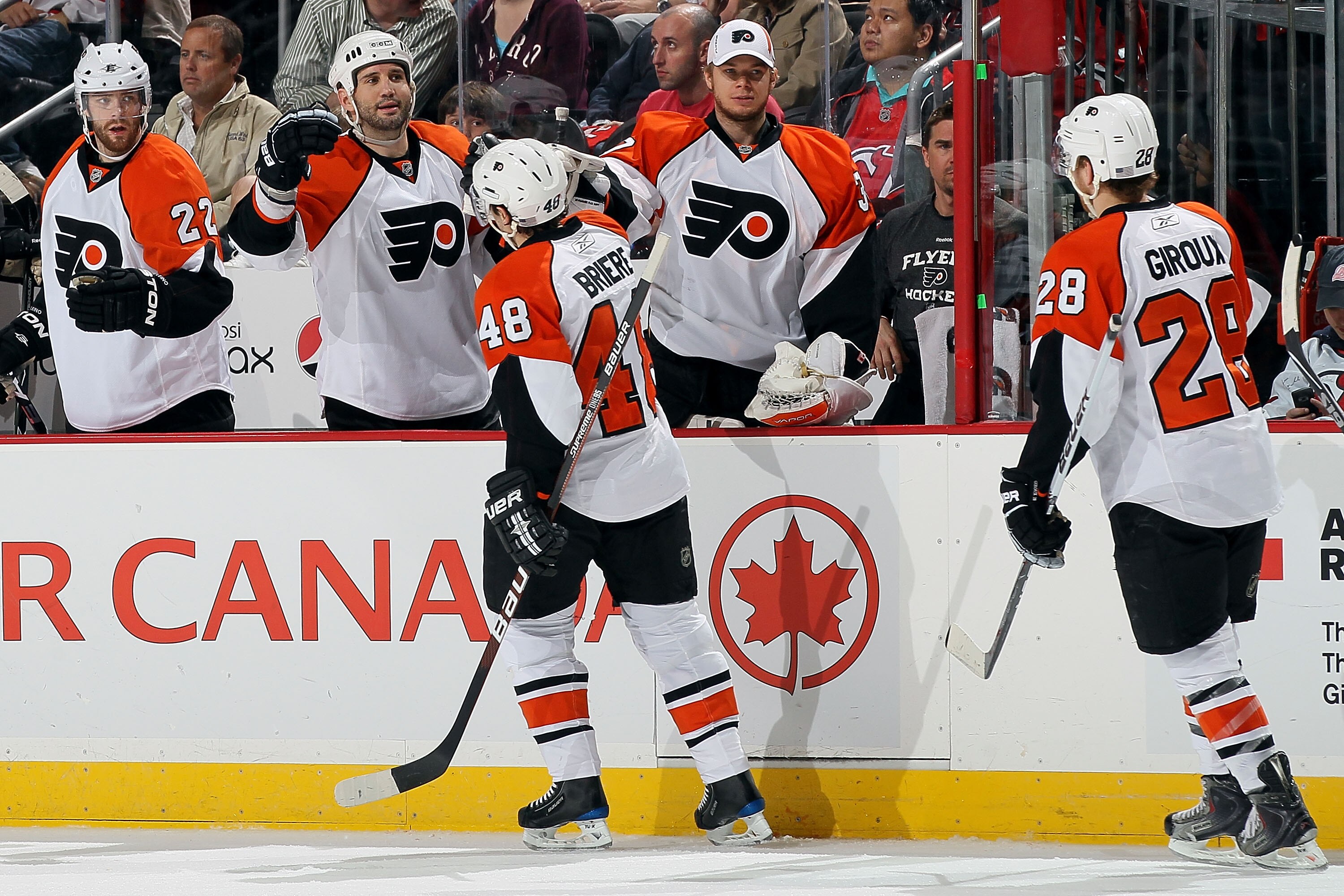 NEWARK, NJ - APRIL 22:  Danny Briere #48 and Claude Giroux #28 of the Philadelphia Flyers celebrate with their team after Giroux's goal in the second period against the New Jersey Devils in Game 5 of the Eastern Conference Quarterfinals during the 2010 NH