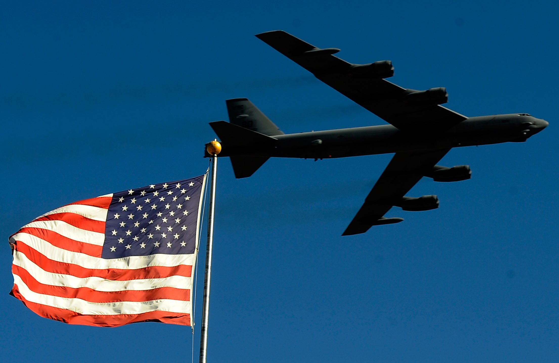 FORT WORTH, TX - NOVEMBER 07:  A B-52 from the 93rd Bomb Squadron, Barksdale Airforce Base, performs a flyover during pre-race ceremonies prior to the NASCAR Sprint Cup Series AAA Texas 500 at Texas Motor Speedway on November 7, 2010 in Fort Worth, Texas.