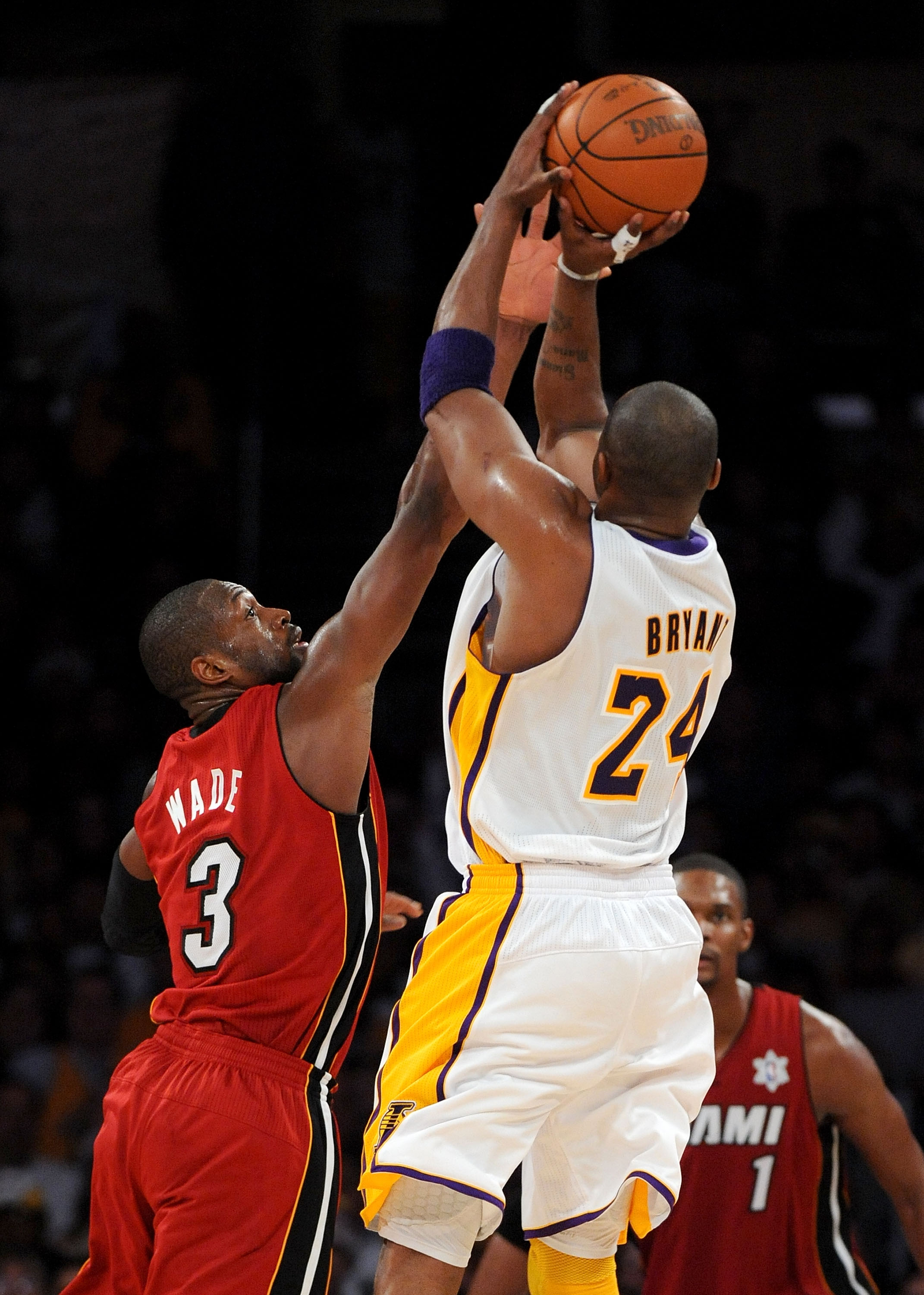LOS ANGELES, CA - DECEMBER 25:  Kobe Bryant #24 of the Los Angeles Lakers puts a shot up against Dwayne Wade #3 of the Miami Heat at Staples Center on December 25, 2010 in Los Angeles, California. NOTE TO USER: User expressly acknowledges and agrees that,