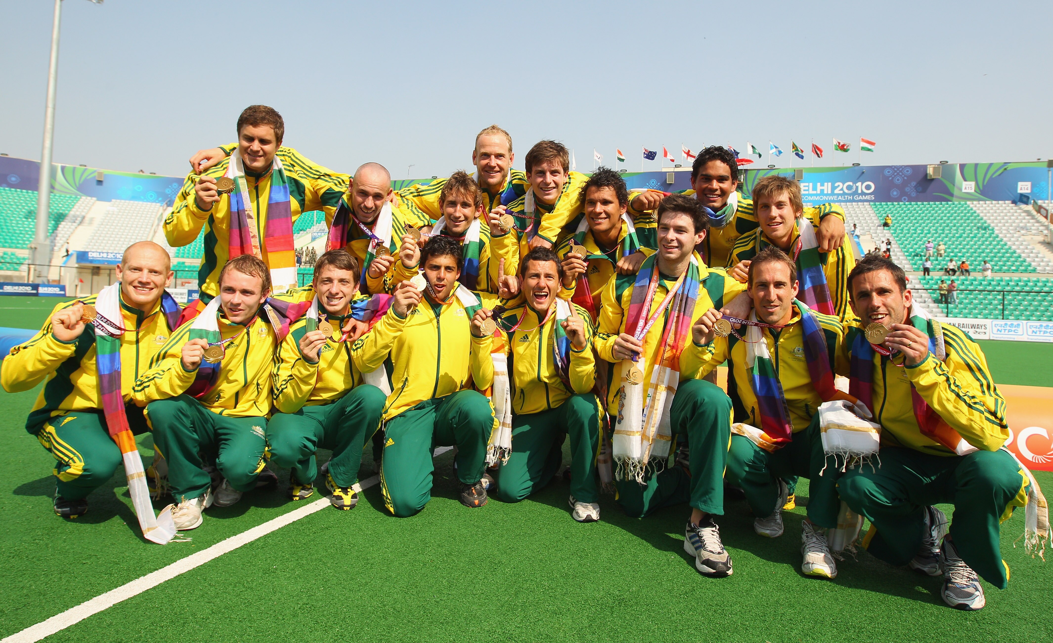 DELHI, INDIA - OCTOBER 14:  The Australian team pose with their gold medals after winning the Men's Gold medal match between Australia and India at the Major Dhyan Chand National Stadium during day eleven of the Delhi 2010 Commonwealth Games on October 14