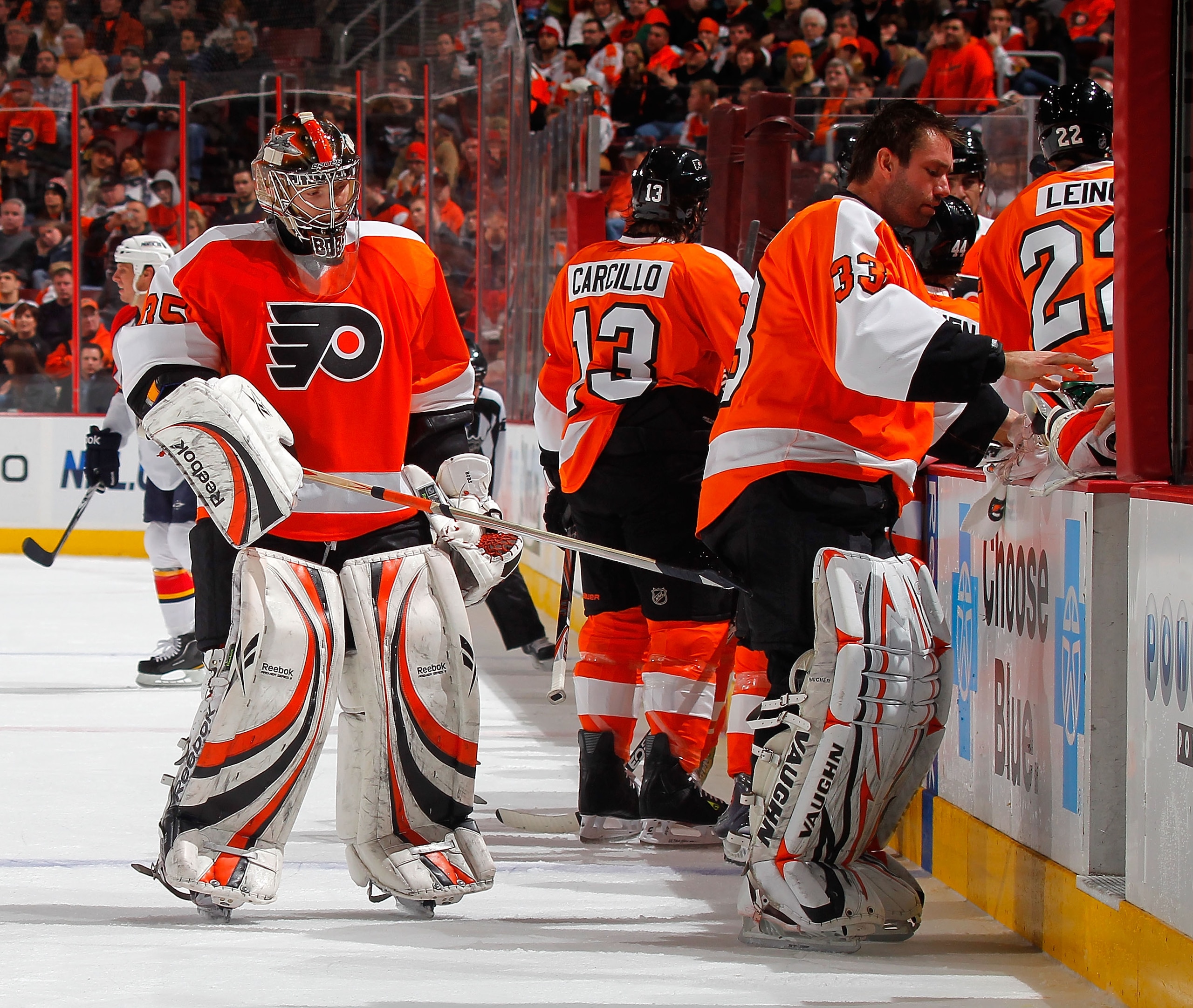 PHILADELPHIA, PA - DECEMBER 20:  Goalie Sergei Bobrovsky #35 of the Philadelphia Flyers gives his teammate Goalie Brian Boucher #33 a tap with his stick as Bobrovsky was just removed from the game after giving up four goals in a period and a half and Bouc