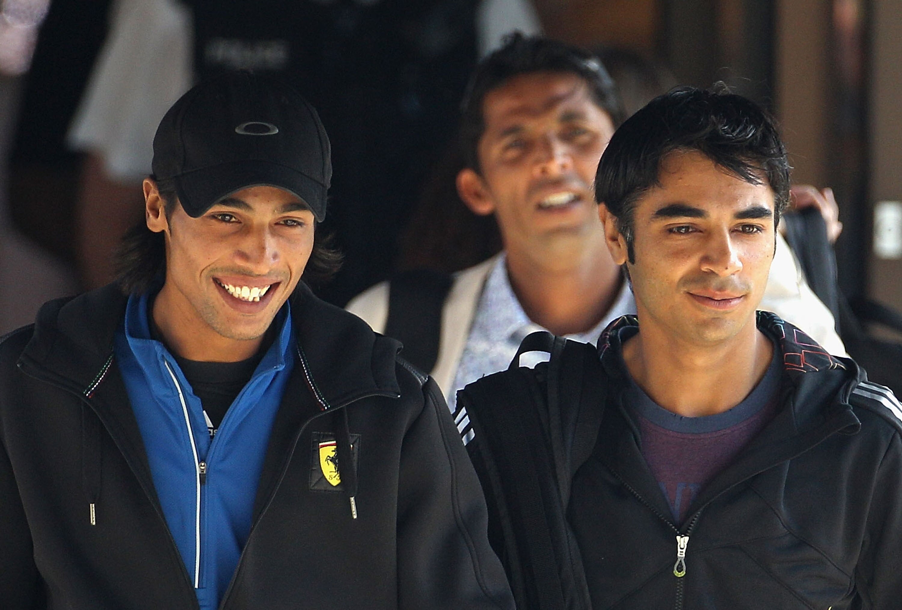 TAUNTON, ENGLAND - SEPTEMBER 01:  Mohammad Aamer (L), Salman Butt (R) and Mohammad Asif (behind) leave the Holiday Inn to board a taxi on September 1, 2010 in Taunton, England. The Pakistan Cricket team are currently the subject of a cricket fixing invest