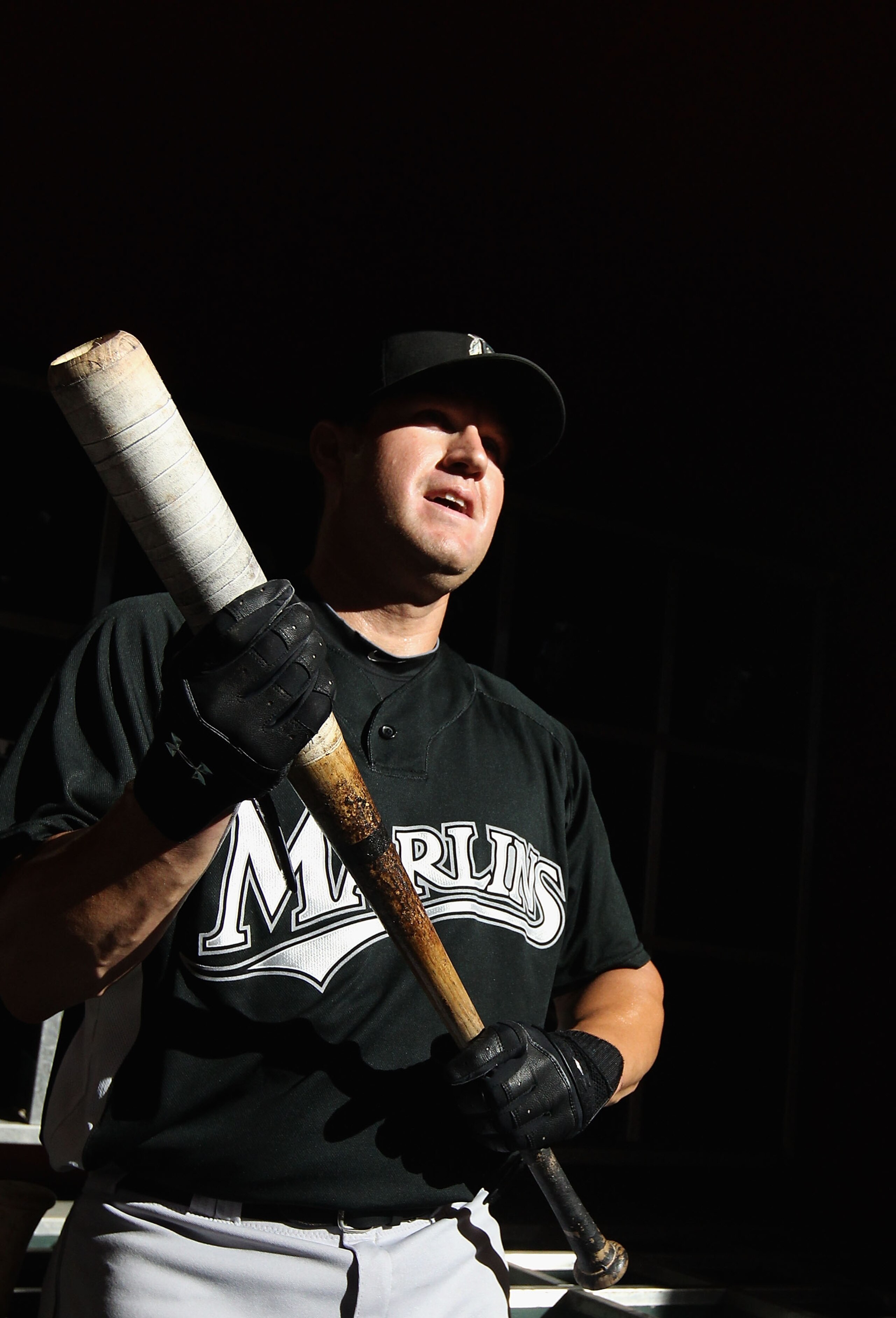 PHOENIX - JULY 08:  Wes Helms #18 of the Florida Marlins warms up before the Major League Baseball game against the Arizona Diamondbacks at Chase Field on July 8, 2010 in Phoenix, Arizona. The Diamondbacks defeated the Marlins 10-4.  (Photo by Christian P