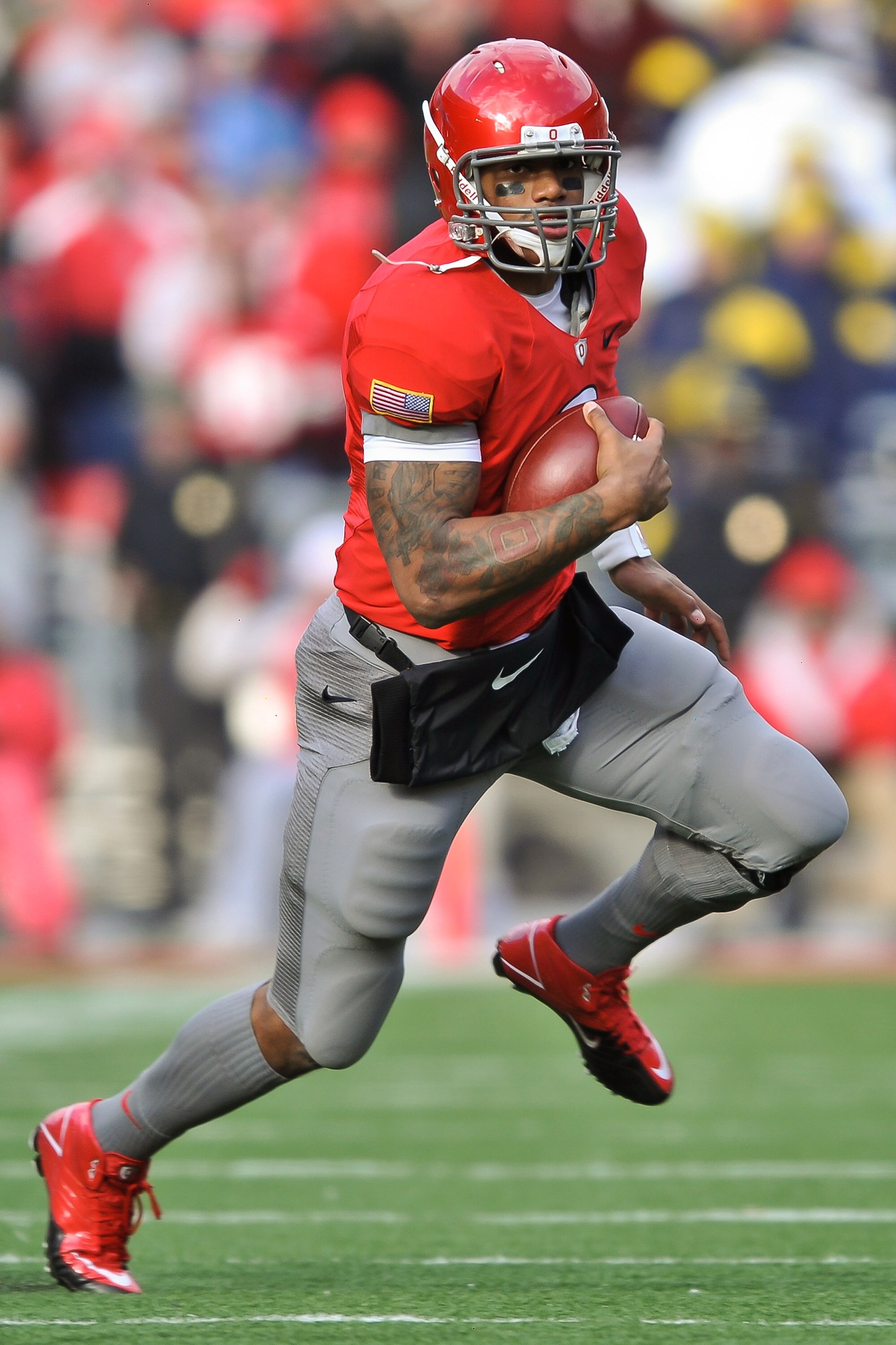 COLUMBUS, OH - NOVEMBER 27:  Quarterback Terrelle Pryor #2 of the Ohio State Buckeyes runs with the ball against the Michigan Wolverines at Ohio Stadium on November 27, 2010 in Columbus, Ohio.  (Photo by Jamie Sabau/Getty Images)