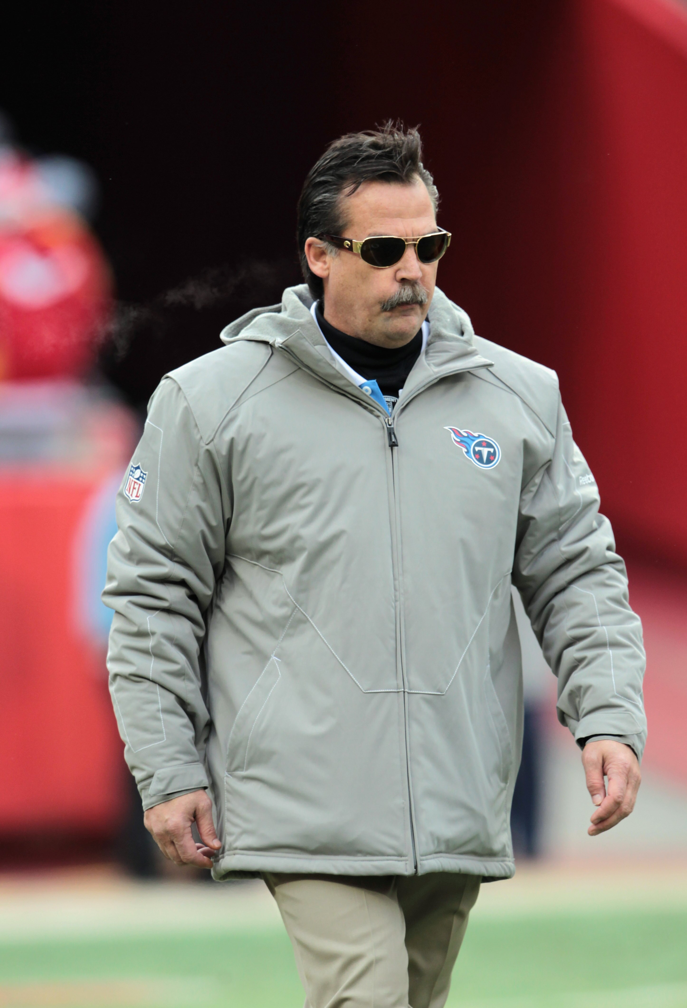 KANSAS CITY, MO - DECEMBER 26:  Head coach Jeff Fisher of the Tennessee Titans walks onto the field prior to the start of the game against the Kansas City Chiefs on December 26, 2010 at Arrowhead Stadium in Kansas City, Missouri.  (Photo by Jamie Squire/G