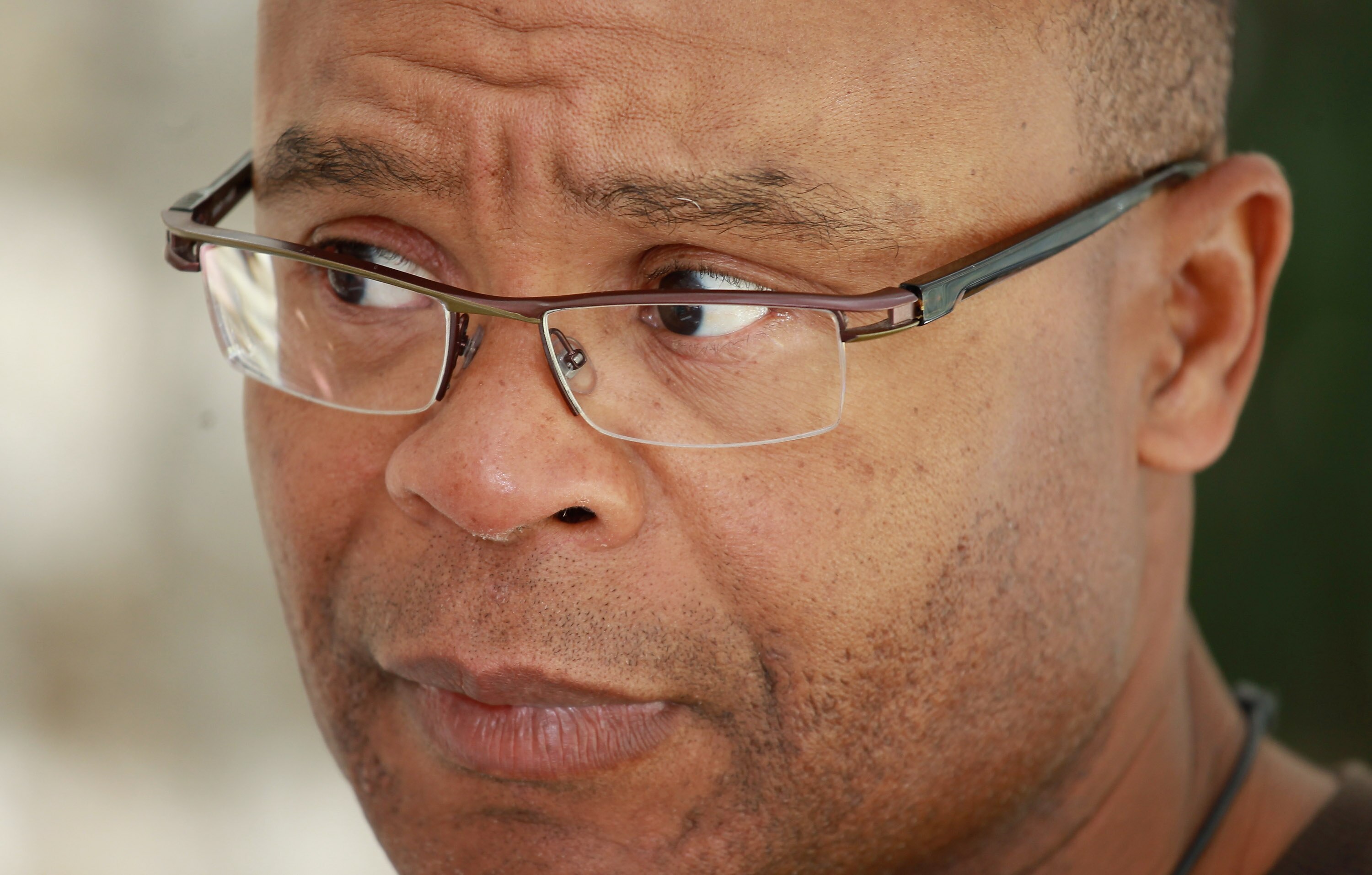 HERTFORD, ENGLAND - OCTOBER 25:  Head Coach Mike Singletary of the San Francisco 49ers addresses a press conference ahead of The San Francisco 49ers meeting the Denver Broncos in the NFL International Series regular-season match at Wembley Stadium on Octo