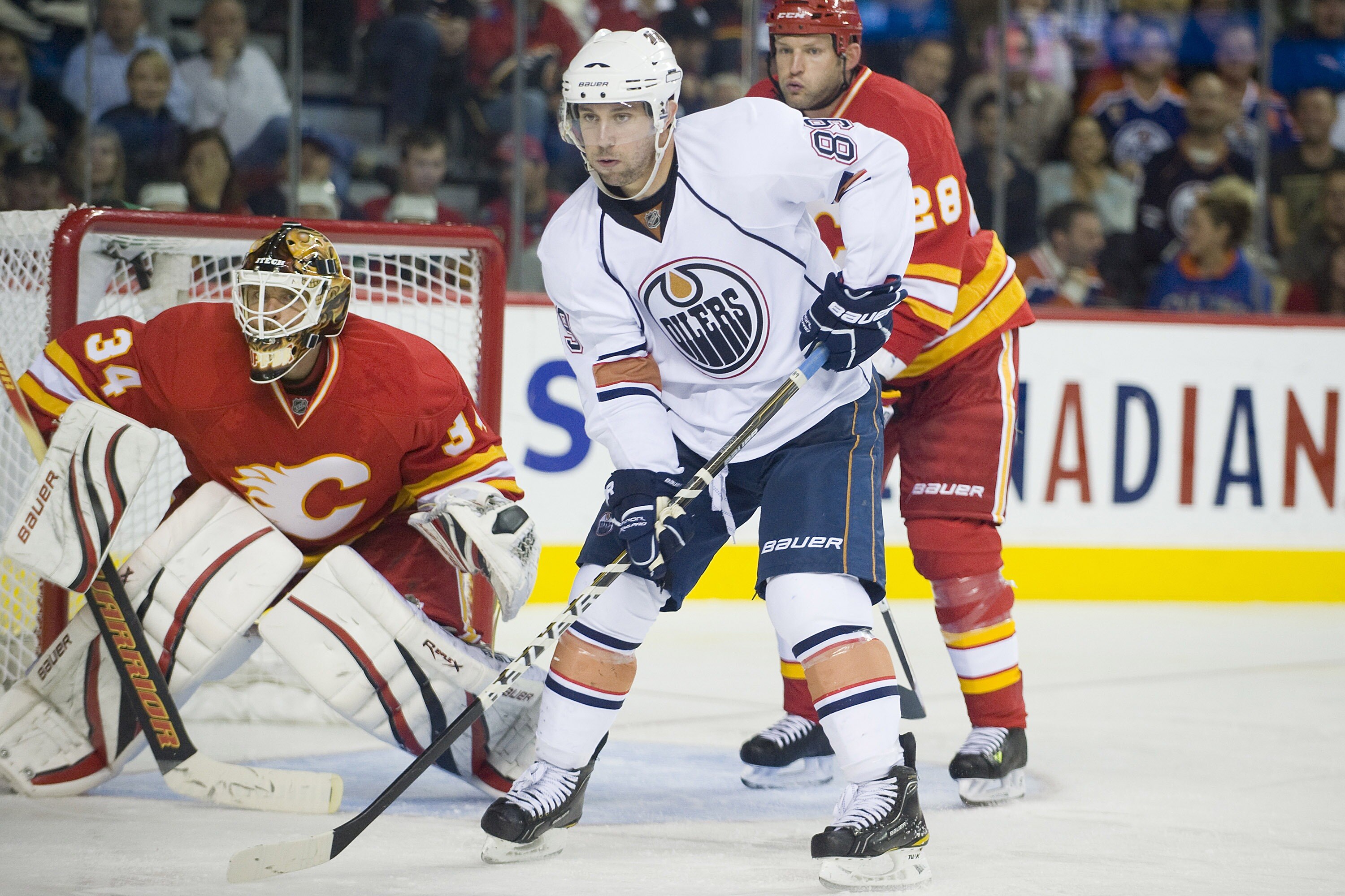 EDMONTON, CANADA - OCTOBER 16:  Edmonton Oilers center Sam Gagner #89 takes a spot in front of the Calgary Flames net at the Scotiabank Saddledome  on October 16, 2010 in Calgary, Alberta, Canada.  The Flames beat the Oilers 5-3.  (Photo by Dylan Lynch/Ge