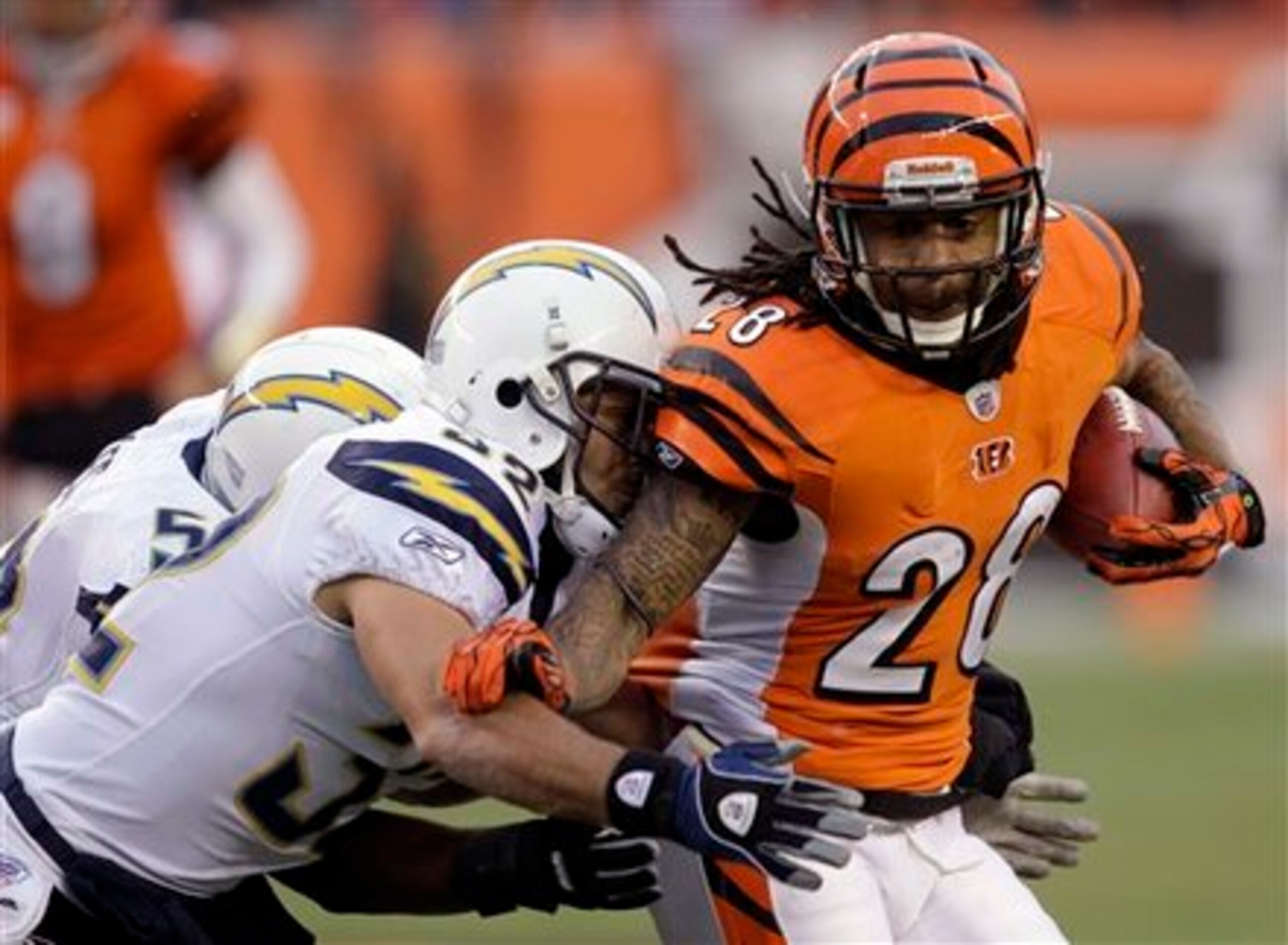 Scott Runs with Dead Weight (Courtesy of the Associated Press)