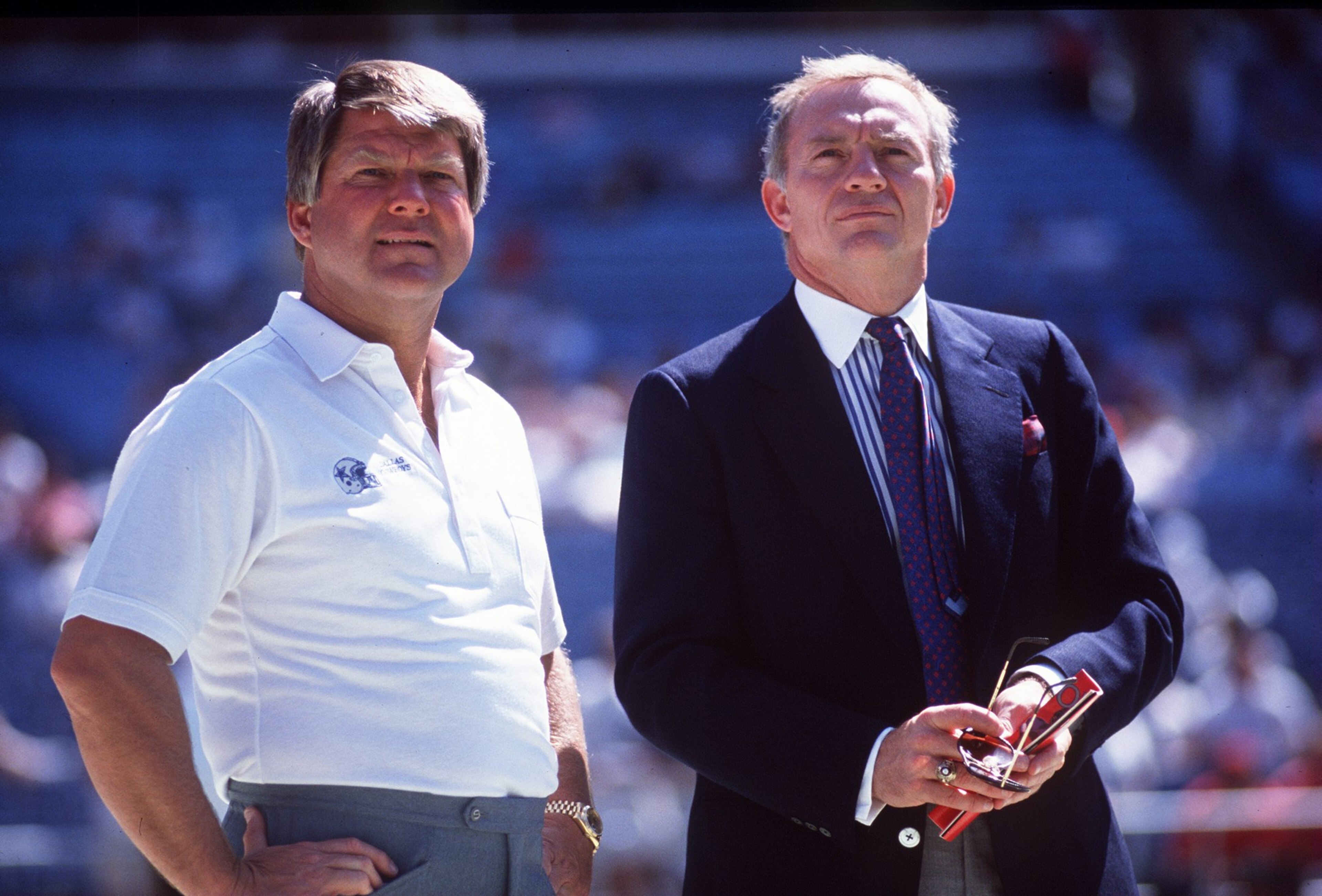 1990: Head coach Jimmy Johnson (left) and owner Jerry Jones of the Dallas Cowboys stand together prior to the start of a Cowboys game at Texas Stadium in Irving, Texas. Mandatory Credit: Allen Dean Steele/Allsport 1990: Head coach Jimmy Johnson (left) and owner Jerry Jones of the Dallas Cowboys stand together prior to the start of a Cowboys game at Texas Stadium in Irving, Texas. Mandatory Credit: Allen Dean Steele/Allsport