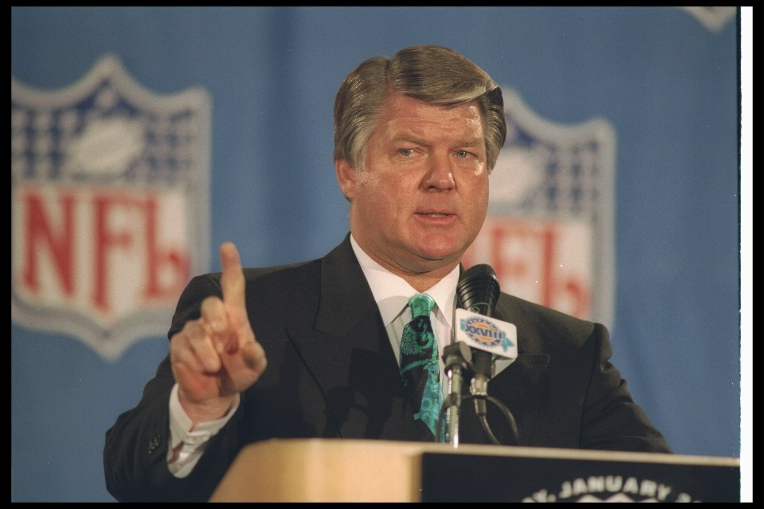 28 Jan 1994:  Dallas Cowboys head coach Jimmy Johnson speaks during a press conference before Super Bowl XXVIII against the Buffalo Bills at the Georgia Dome in Atlanta, Georgia.  The Cowboys won the game, 30-13. Mandatory Credit: Jonathan Daniel  /Allspo