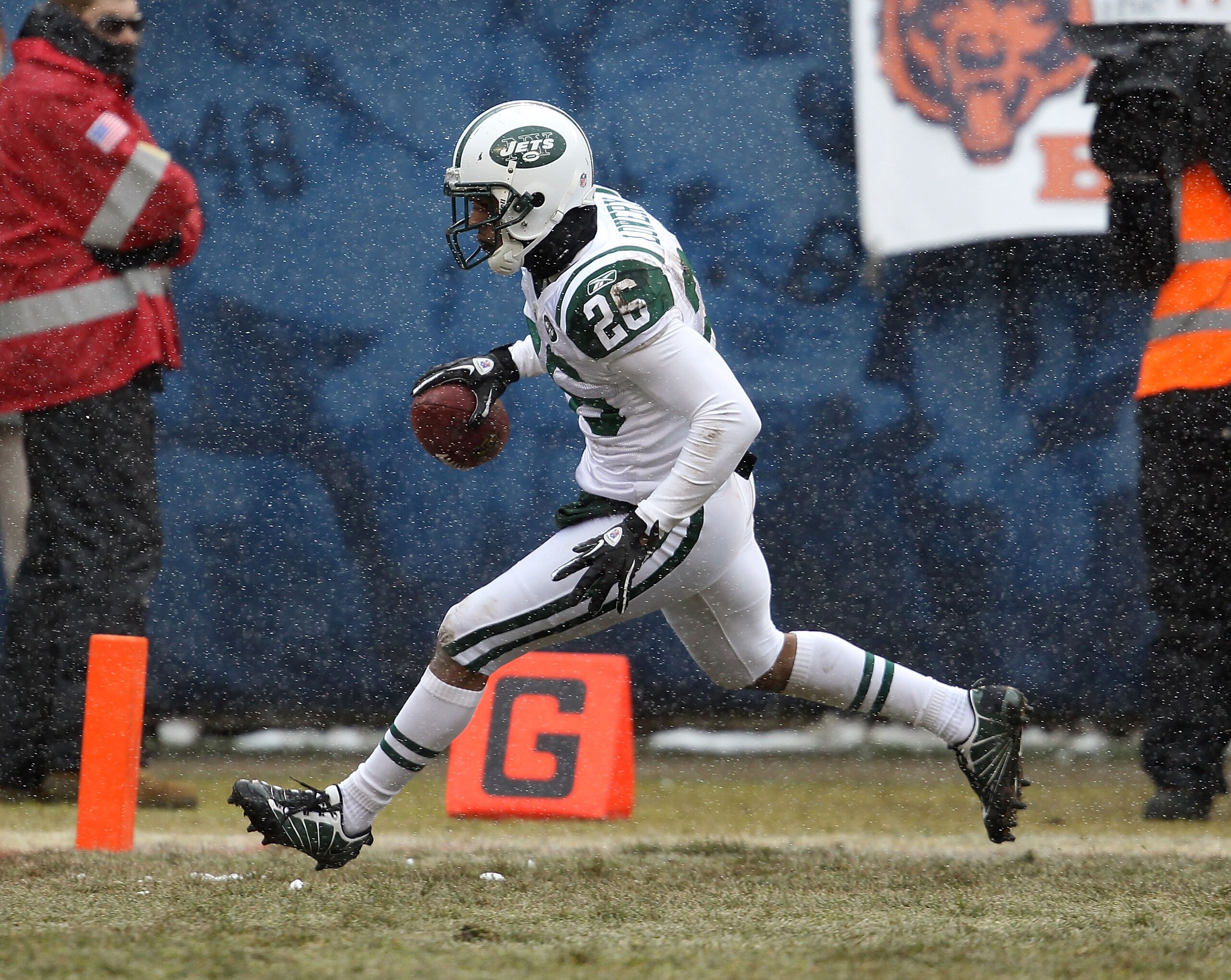 CHICAGO, IL - DECEMBER 26: Dwight Lowery #26 of the New York Jets crosses into the end zone after interceptiong a pass for a touchdown against the Chicago Bearsat Soldier Field on December 26, 2010 in Chicago, Illinois. The Bears defeated the Jets 38-34.