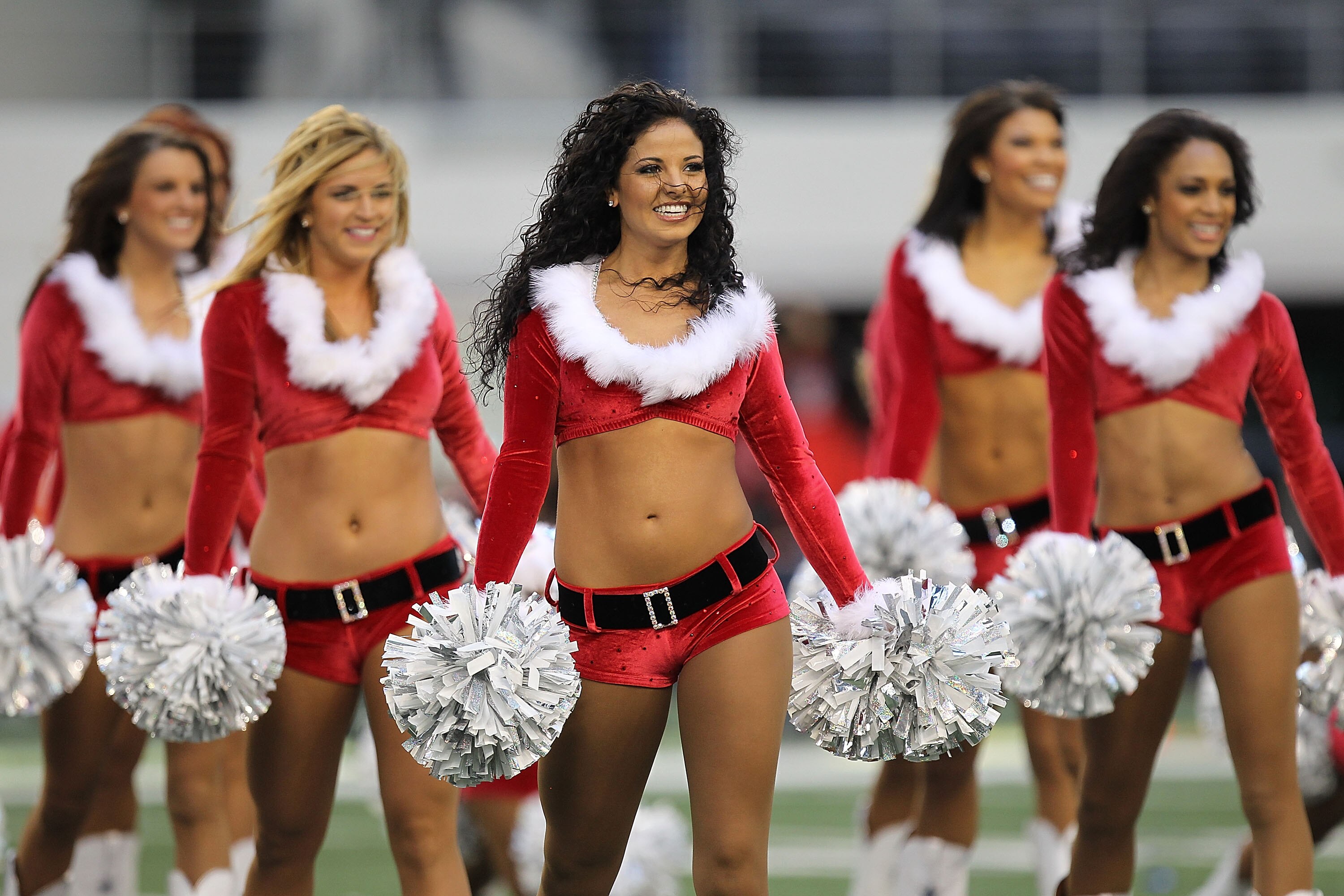 ARLINGTON, TX - DECEMBER 19:  The Dallas Cowboys Cheerleaders perform at Cowboys Stadium on December 19, 2010 in Arlington, Texas.  (Photo by Ronald Martinez/Getty Images)