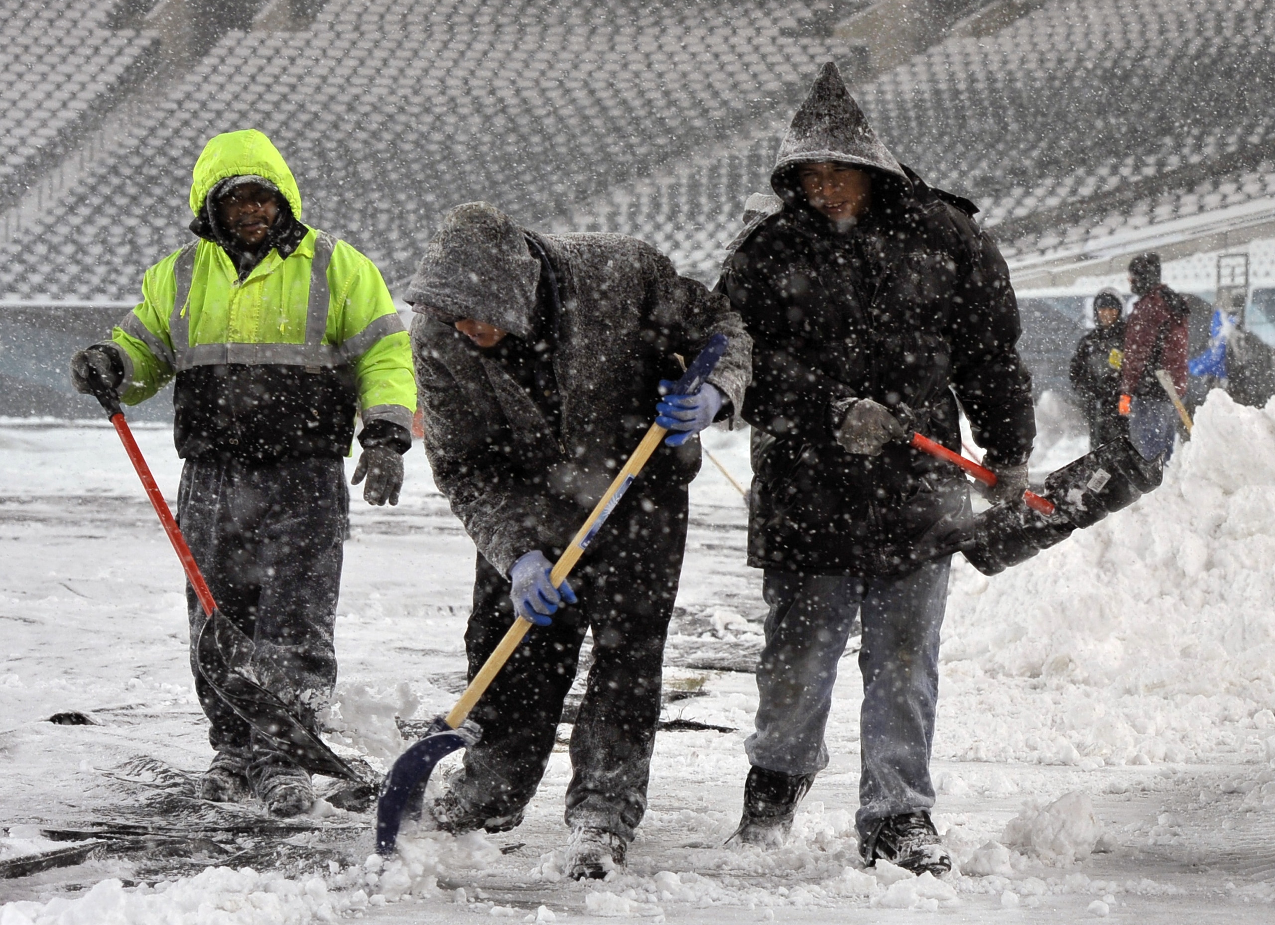 PHILADELPHIA - DECEMBER 26: Personnel work to remove snow at Lincoln Financial Field on December 26, 2010 in Philadelphia, Pennsylvania. The game between the Minnesota Vikings and Philadelphia Eagles was postponed by the NFL.(Photo by Drew Hallowell/Getty