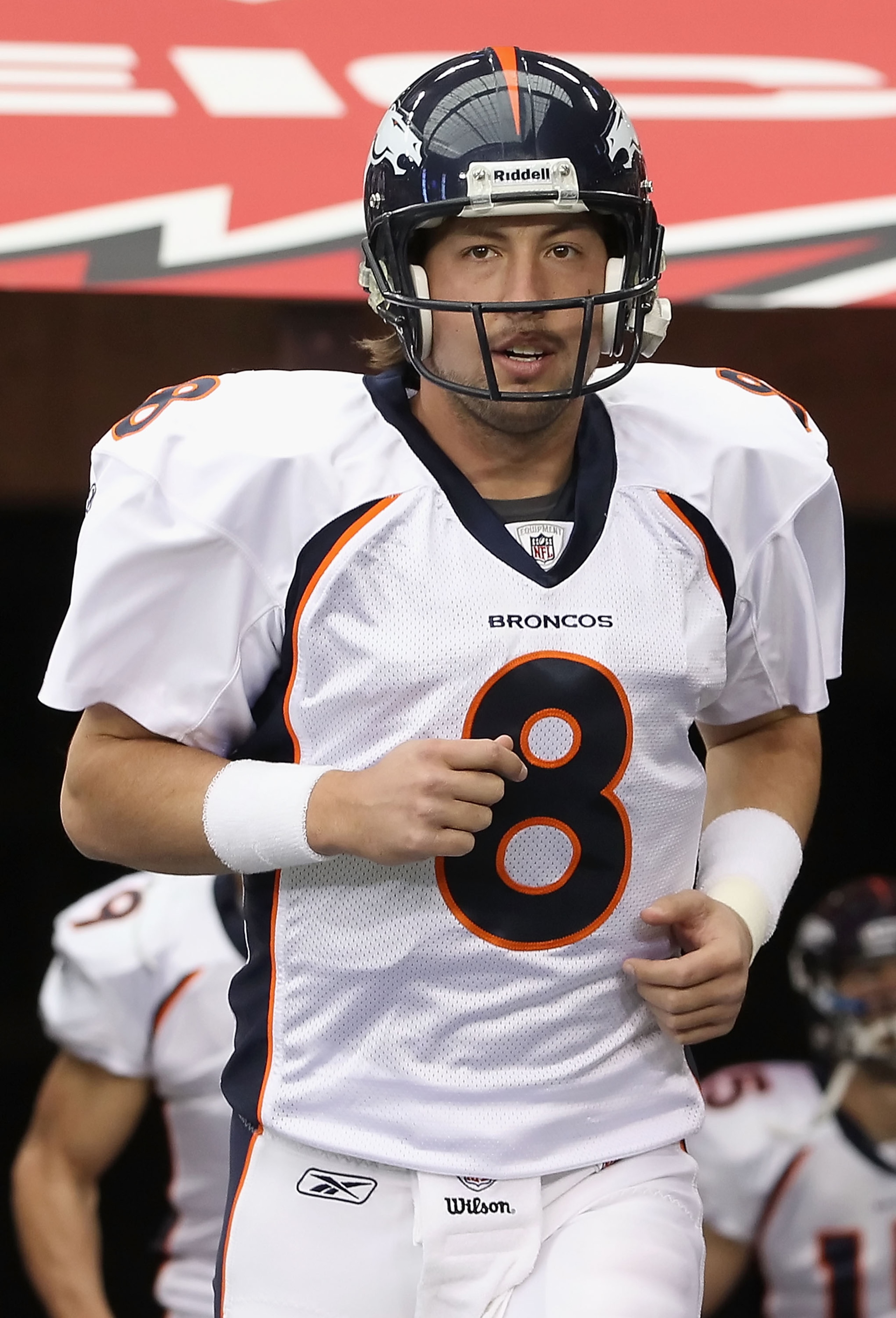 GLENDALE, AZ - DECEMBER 12: Quarterback Kyle Orton #8 of the Denver Broncos runs out onto the field before the NFL game against the Arizona Cardinals at the University of Phoenix Stadium on December 12, 2010 in Glendale, Arizona. The Cardinals defeated GLENDALE, AZ - DECEMBER 12: Quarterback Kyle Orton #8 of the Denver Broncos runs out onto the field before the NFL game against the Arizona Cardinals at the University of Phoenix Stadium on December 12, 2010 in Glendale, Arizona. The Cardinals defeated