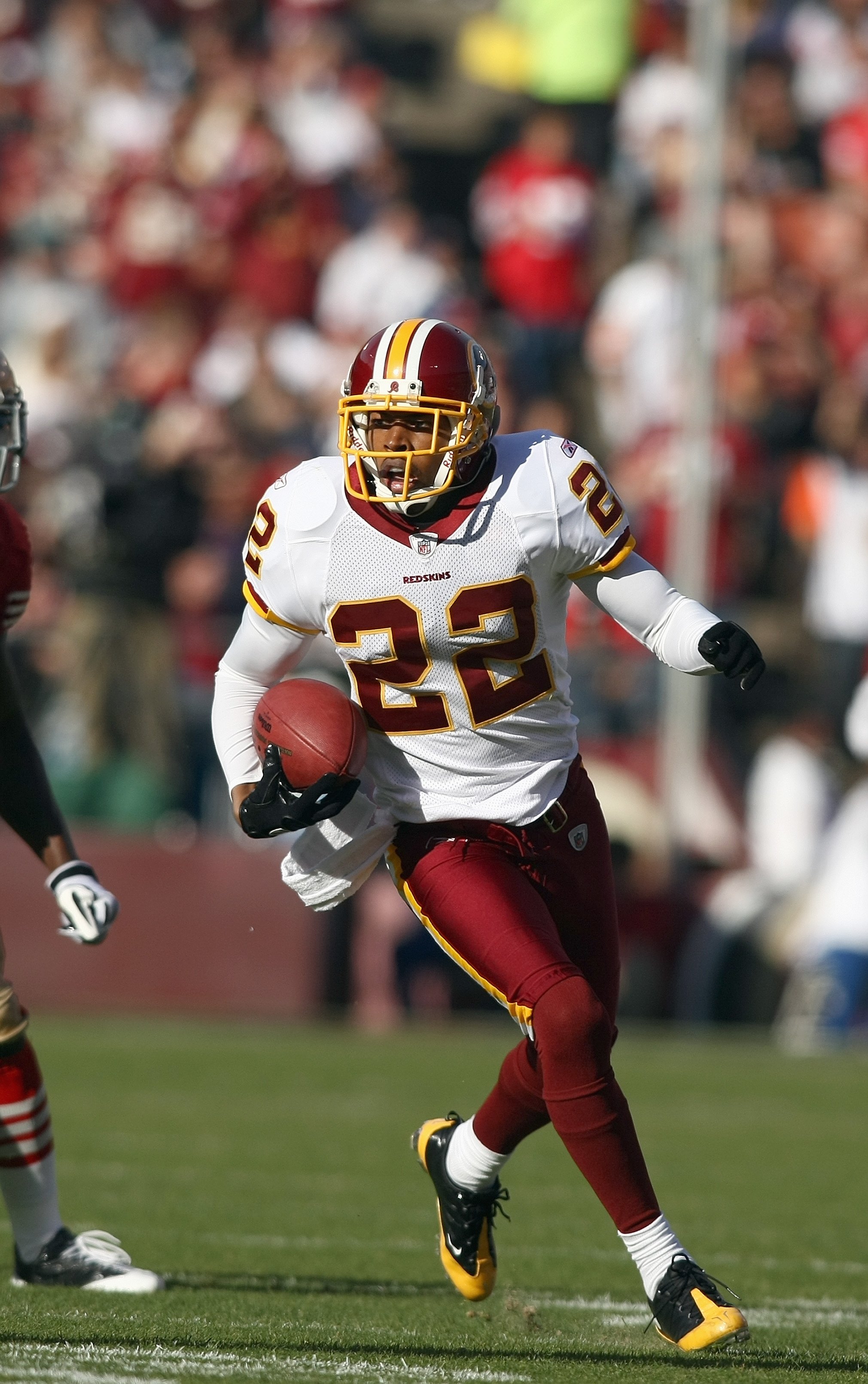 SAN FRANCISCO - DECEMBER 28:  Carlos Rogers #22 of the Washington Redskins carries the ball during the game against of the San Fransisco 49ers at Candlestick Park on December 28, 2008 in San Francisco, California. (Photo by: Jonathan Ferrey/Getty Images)