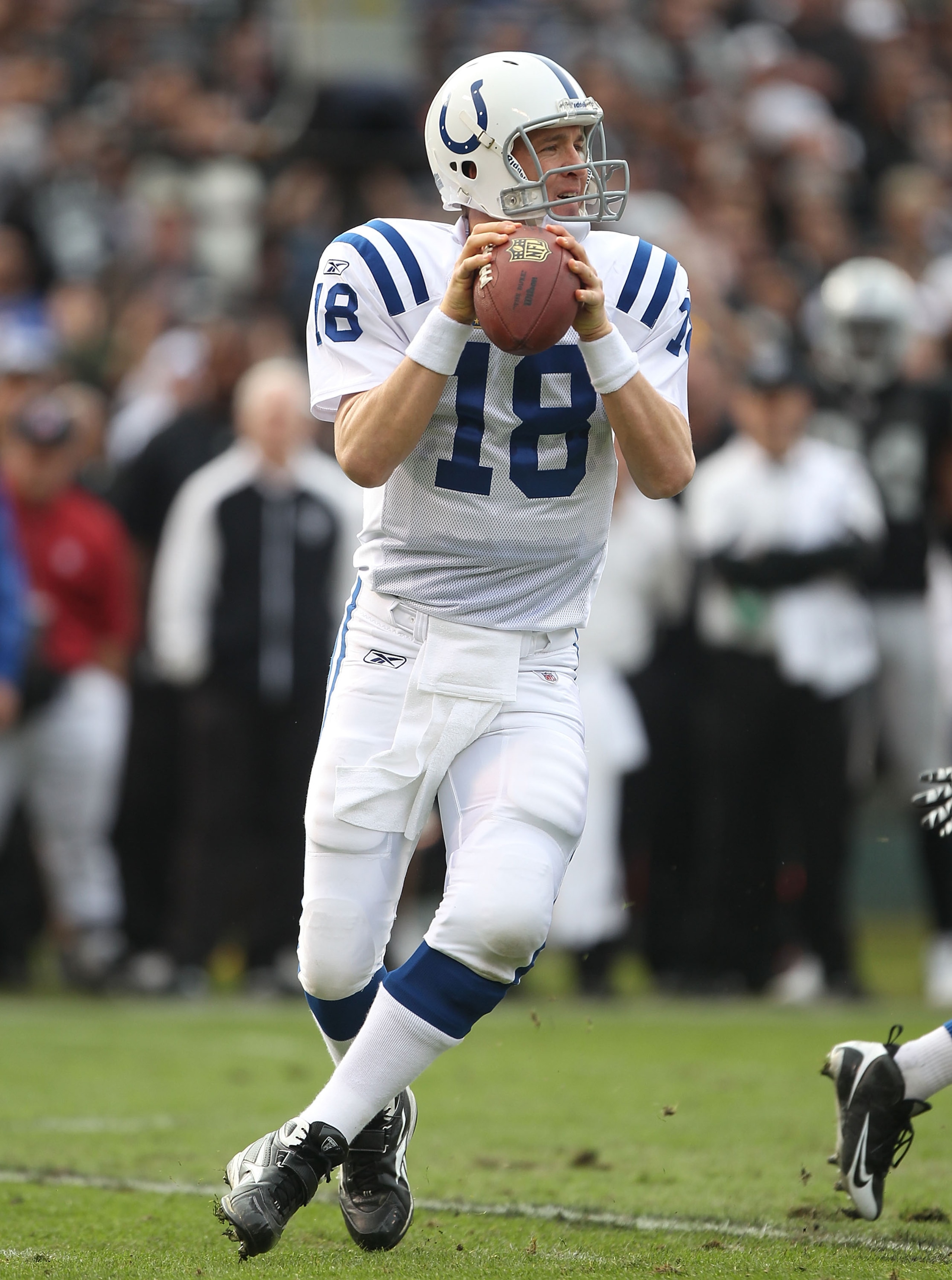 OAKLAND, CA - DECEMBER 26:  Peyton Manning #18 of the Indianapolis Colts passes against the Oakland Raiders during an NFL game at Oakland-Alameda County Coliseum on December  26, 2010 in Oakland, California.  (Photo by Jed Jacobsohn/Getty Images)