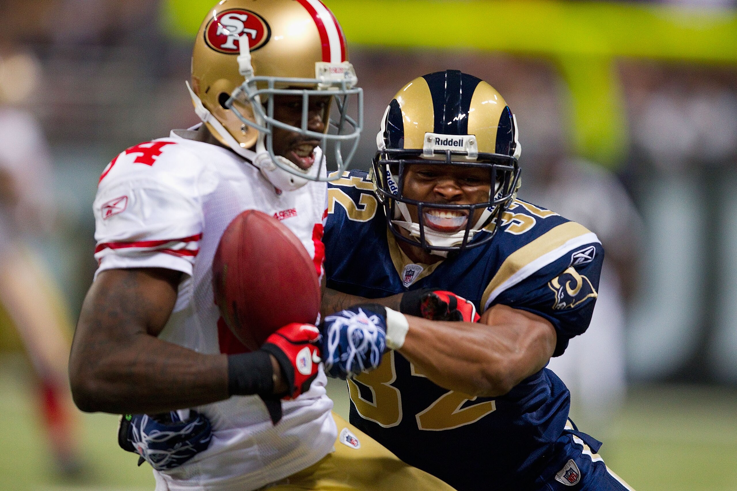 ST. LOUIS, MO - DECEMBER 26: Josh Morgan #84 of the San Francisco 49ers hauls in a pass against Bradley Fletcher #32 of the St. Louis Rams at the Edward Jones Dome on December 26, 2010 in St. Louis, Missouri. The Rams beat the 49ers 25-17. (Photo by Dilip