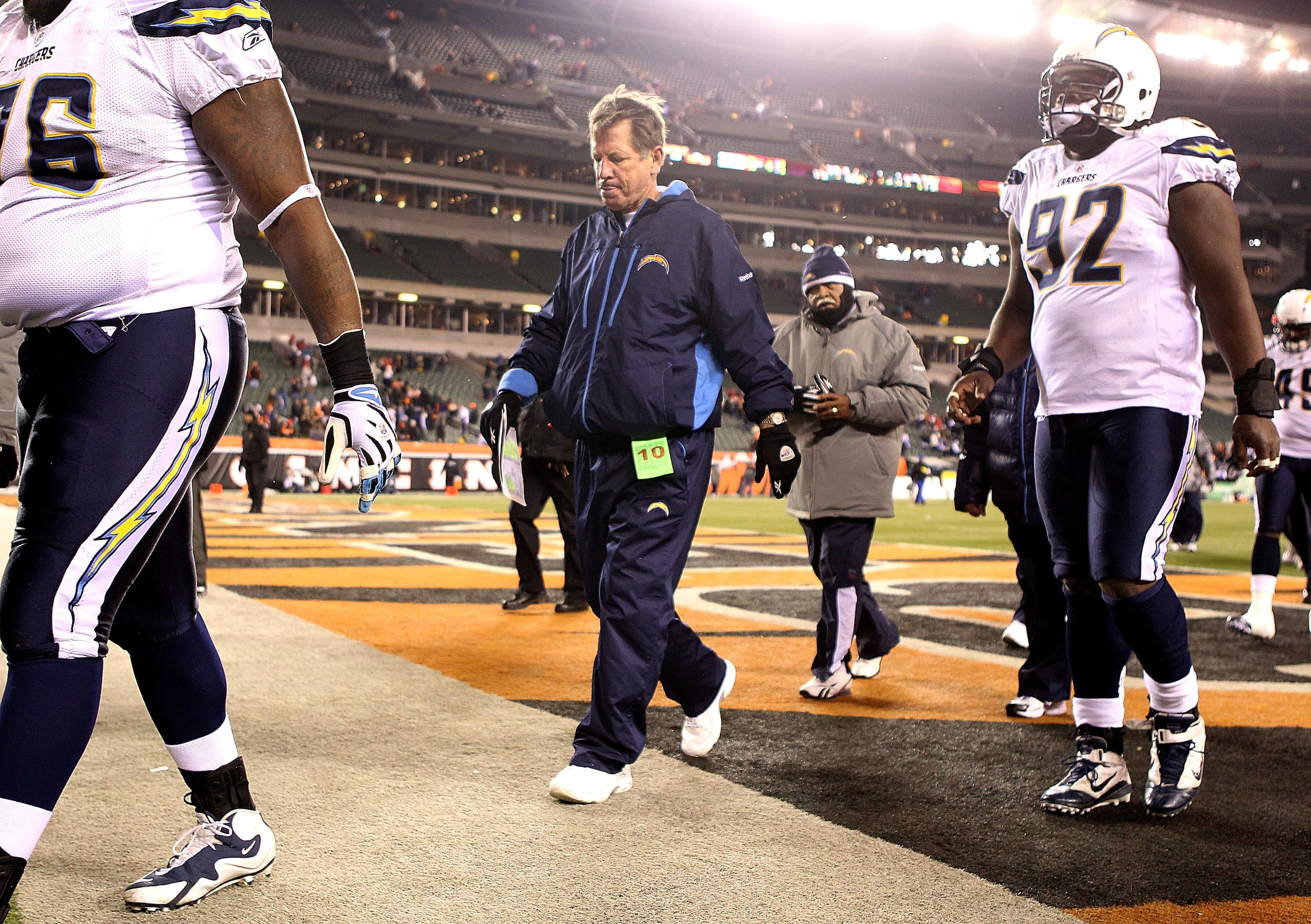 CINCINNATI - DECEMBER 26: Norv Turner (center) the Head Coach of the San Diego Chargers walks off of the field following the Chargers 34-20 loss to the Cincinnati Bengals during the NFL game at Paul Brown Stadium on December 26, 2010 in Cincinnati, Ohio. CINCINNATI - DECEMBER 26: Norv Turner (center) the Head Coach of the San Diego Chargers walks off of the field following the Chargers 34-20 loss to the Cincinnati Bengals during the NFL game at Paul Brown Stadium on December 26, 2010 in Cincinnati, Ohio.