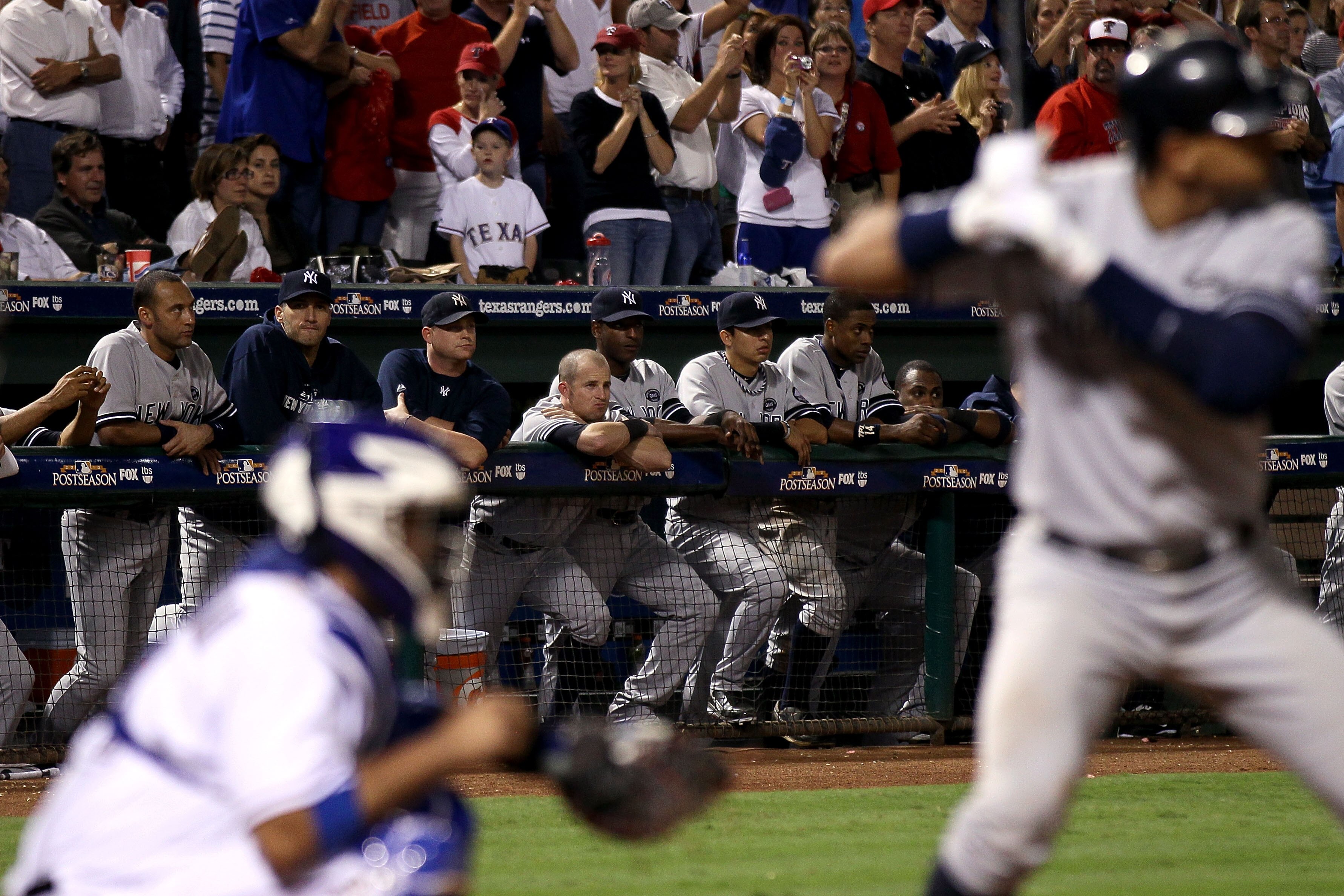 ARLINGTON, TX - OCTOBER 22:  (L-R) Derek Jeter #2 and Andy Pettitte #46 of the New York Yankees look on from the dugout as Alex Rodriguez #13 bats in the top of the ninth inning against the Texas Rangers in Game Six of the ALCS during the 2010 MLB Playoff