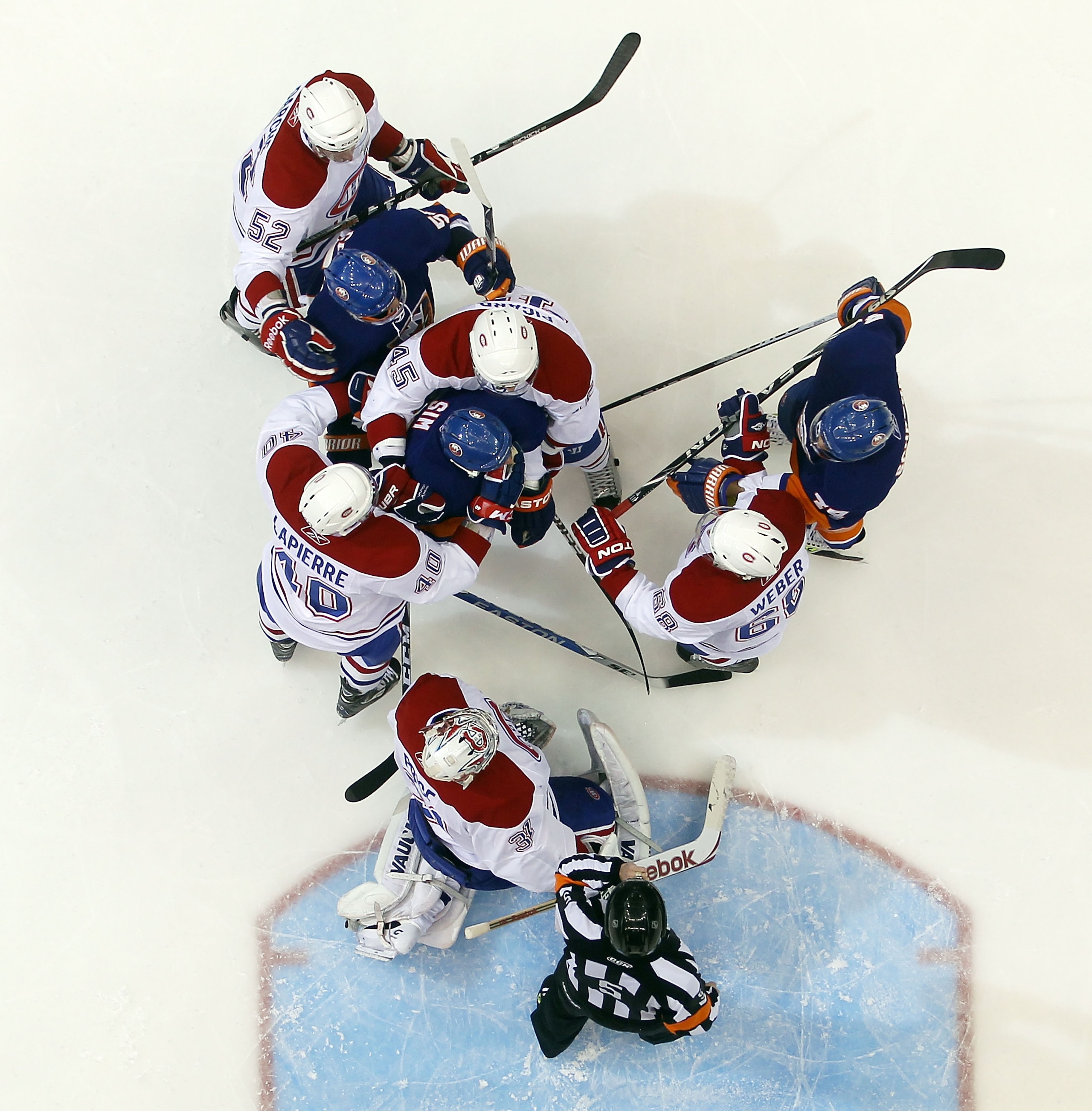 UNIONDALE, NY - DECEMBER 26:  The Montreal Canadiens skate against the New York Islanders at the Nassau Coliseum on December 26, 2010 in Uniondale, New York. The Islanders defeated the Canadiens 4-1. (Photo by Bruce Bennett/Getty Images)