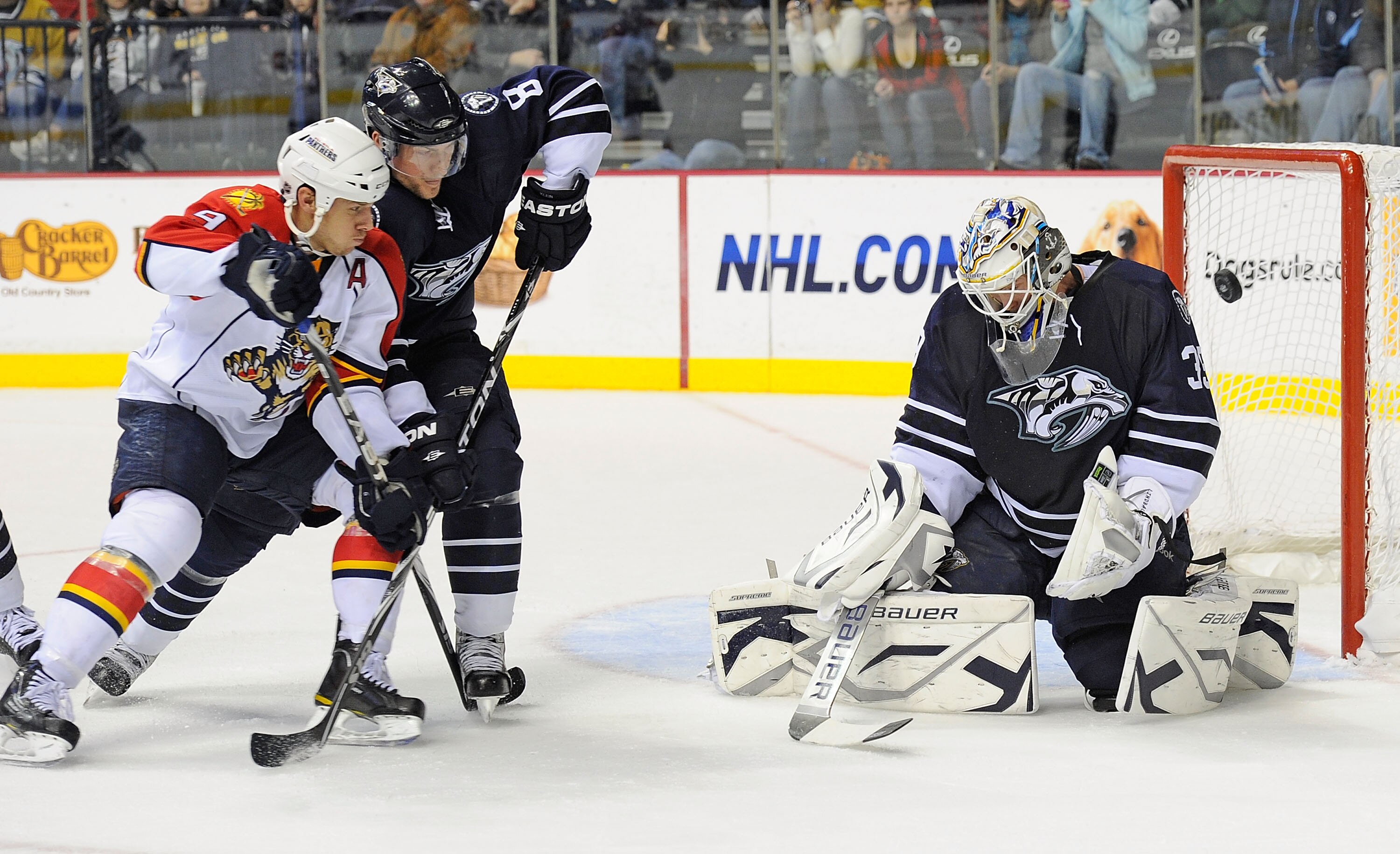 NASHVILLE, TN - DECEMBER 11:  Goalie Anders Lindback #39 of the Nashville Predators makes a save on a shot by Bryan McCabe #24 of the Florida Panthers on December 11, 2010 at the Bridgestone Arena in Nashville, Tennessee.  (Photo by Frederick Breedon/Gett