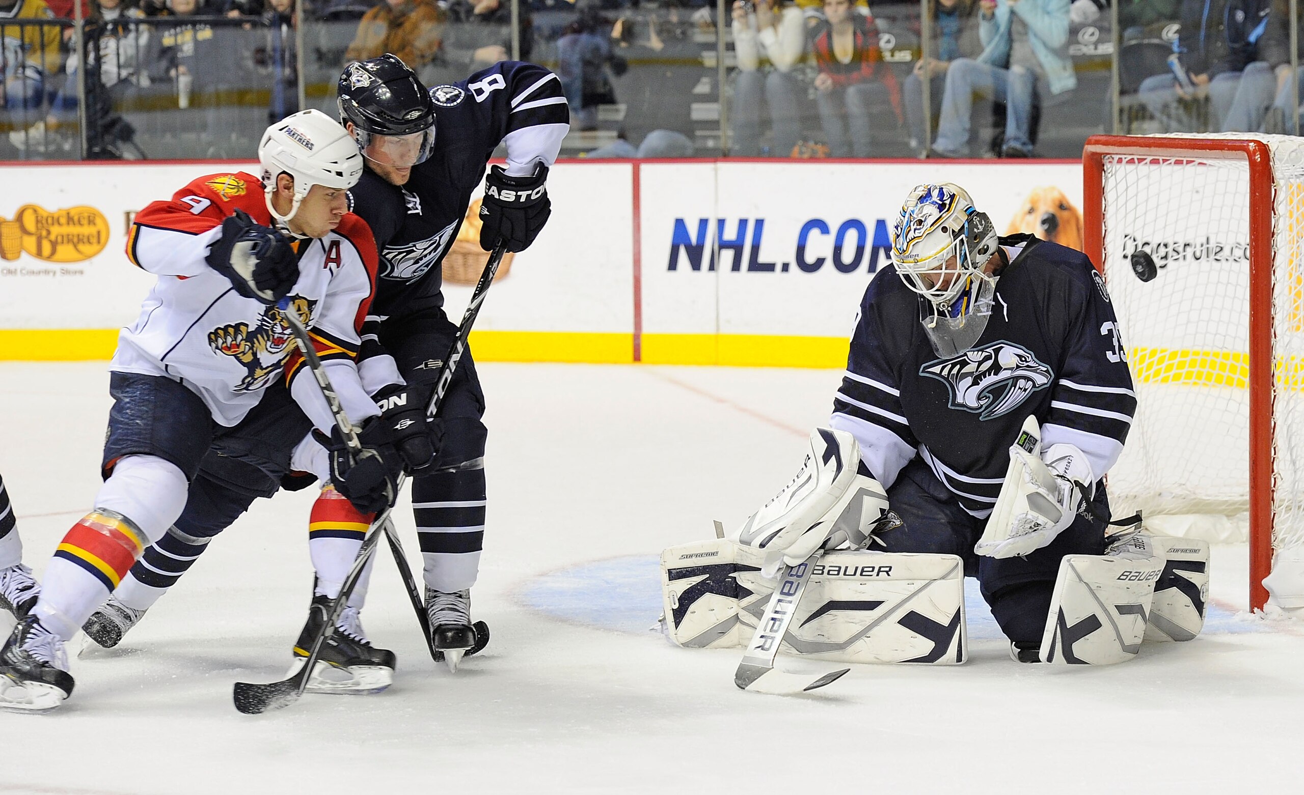 NASHVILLE, TN - DECEMBER 11:  Goalie Anders Lindback #39 of the Nashville Predators makes a save on a shot by Bryan McCabe #24 of the Florida Panthers on December 11, 2010 at the Bridgestone Arena in Nashville, Tennessee.  (Photo by Frederick Breedon/Gett