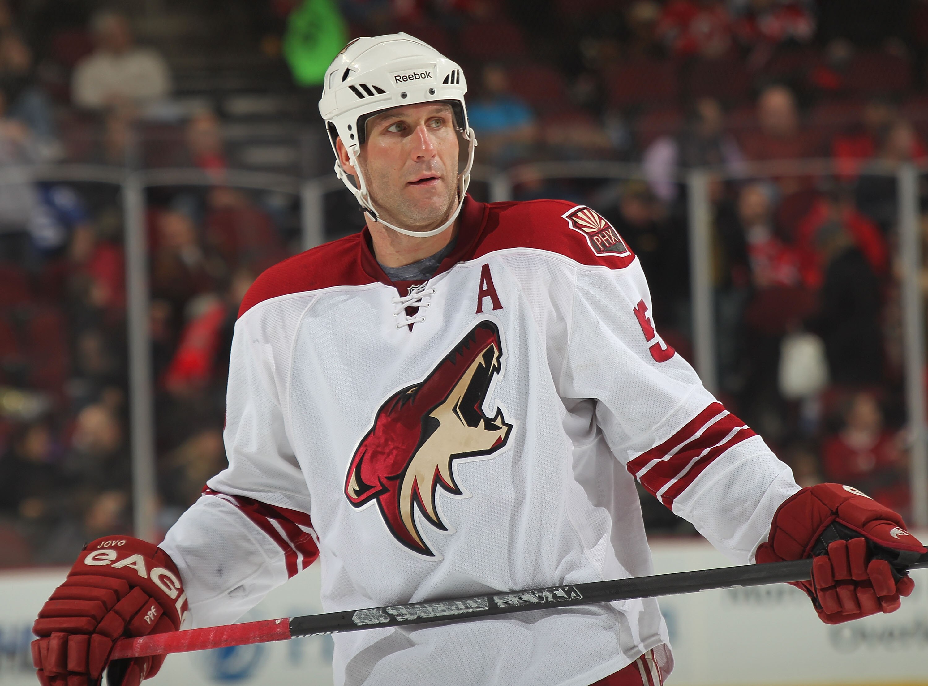 NEWARK, NJ - DECEMBER 15:  Ed Jovanovski #55 of the Phoenix Coyotes waits for a faceoff during a hockey game against the New Jersey Devils at the Prudential Center on December 15, 2010 in Newark, New Jersey.  (Photo by Paul Bereswill/Getty Images)