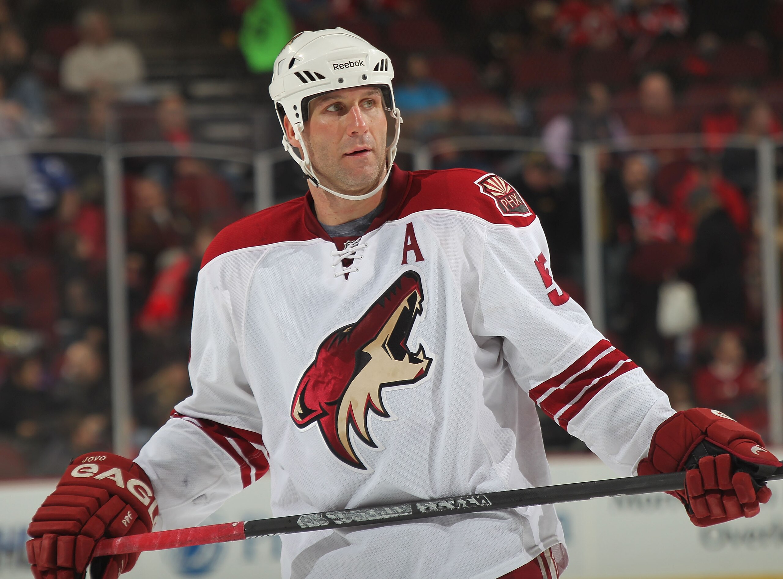 NEWARK, NJ - DECEMBER 15:  Ed Jovanovski #55 of the Phoenix Coyotes waits for a faceoff during a hockey game against the New Jersey Devils at the Prudential Center on December 15, 2010 in Newark, New Jersey.  (Photo by Paul Bereswill/Getty Images)