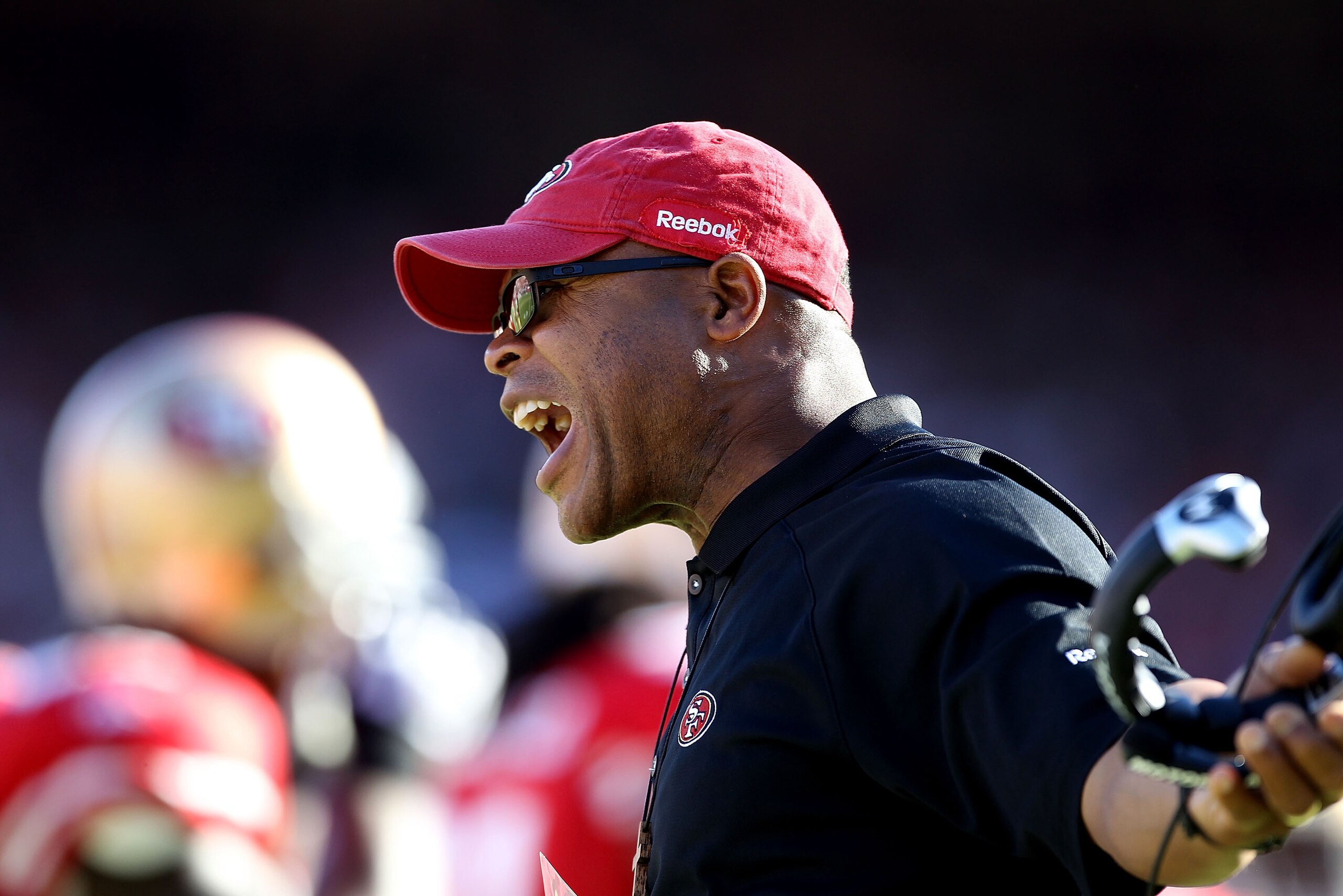 SAN FRANCISCO - NOVEMBER 14:  Head coach Mike Singletary of the San Francisco 49ers shouts on the sidelines during their game against the St. Louis Rams at Candlestick Park on November 14, 2010 in San Francisco, California.  (Photo by Ezra Shaw/Getty Imag