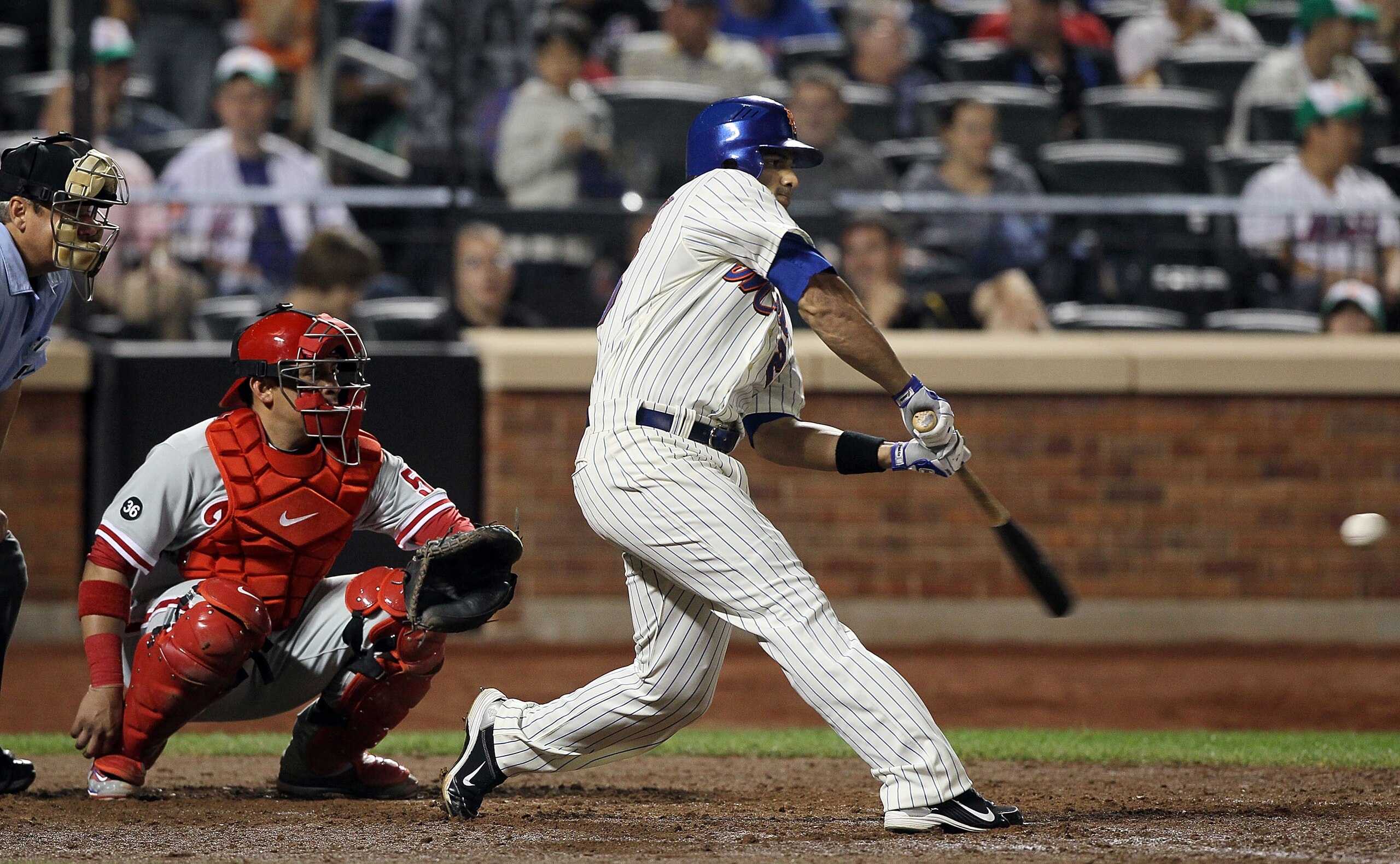 NEW YORK - AUGUST 14:  Fernando Martinez #26 of the New York Mets bats against the Philadelphia Phillies on August 14, 2010 at Citi Field in the Flushing neighborhood of the Queens borough of New York City. The Phillies defeated the Mets 4-0.  (Photo by J