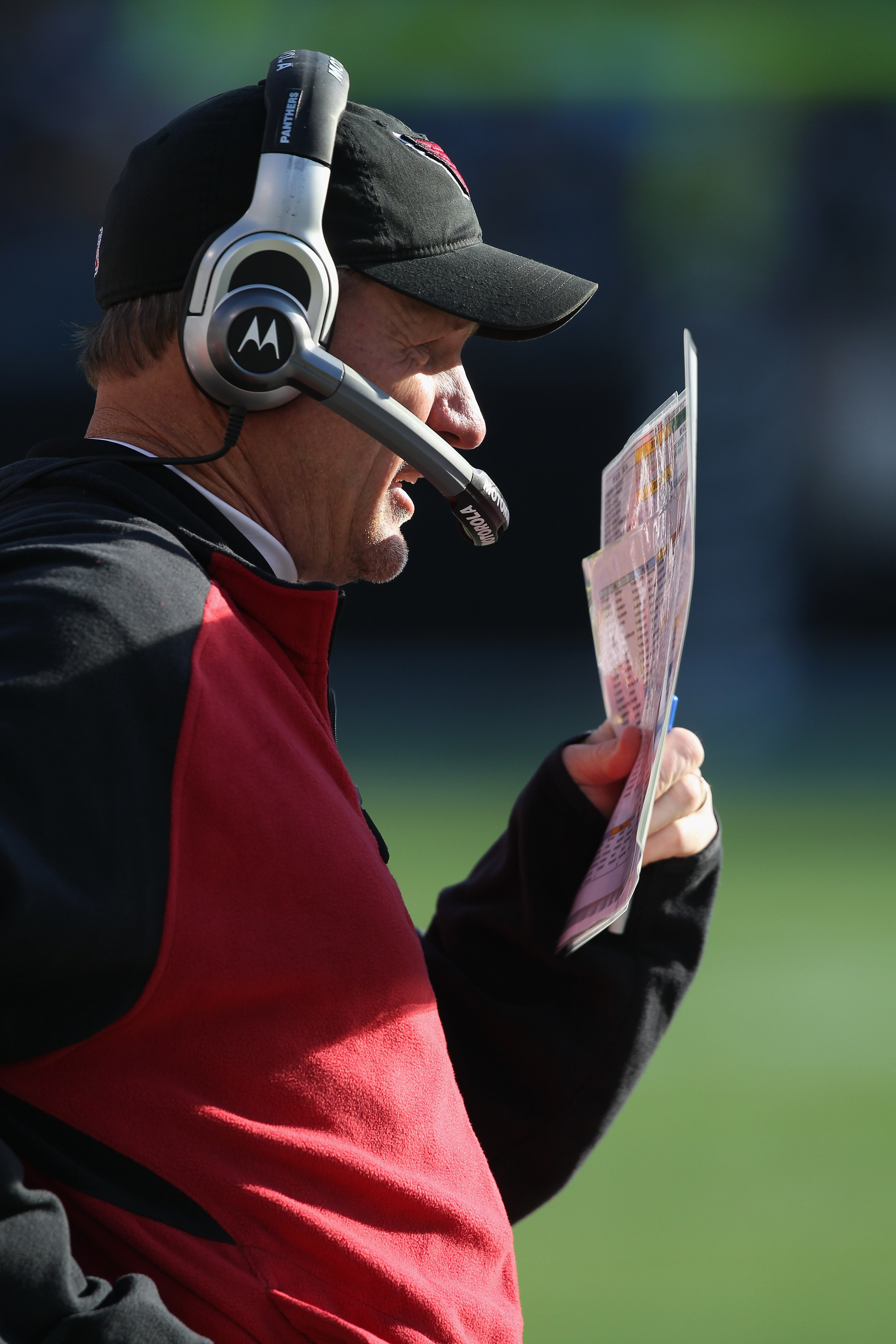 CHARLOTTE, NC - DECEMBER 19:  Head coach Ken Whisenhunt of the Arizona Cardinals calls a play against the Carolina Panthers during their game at Bank of America Stadium on December 19, 2010 in Charlotte, North Carolina.  (Photo by Streeter Lecka/Getty Ima