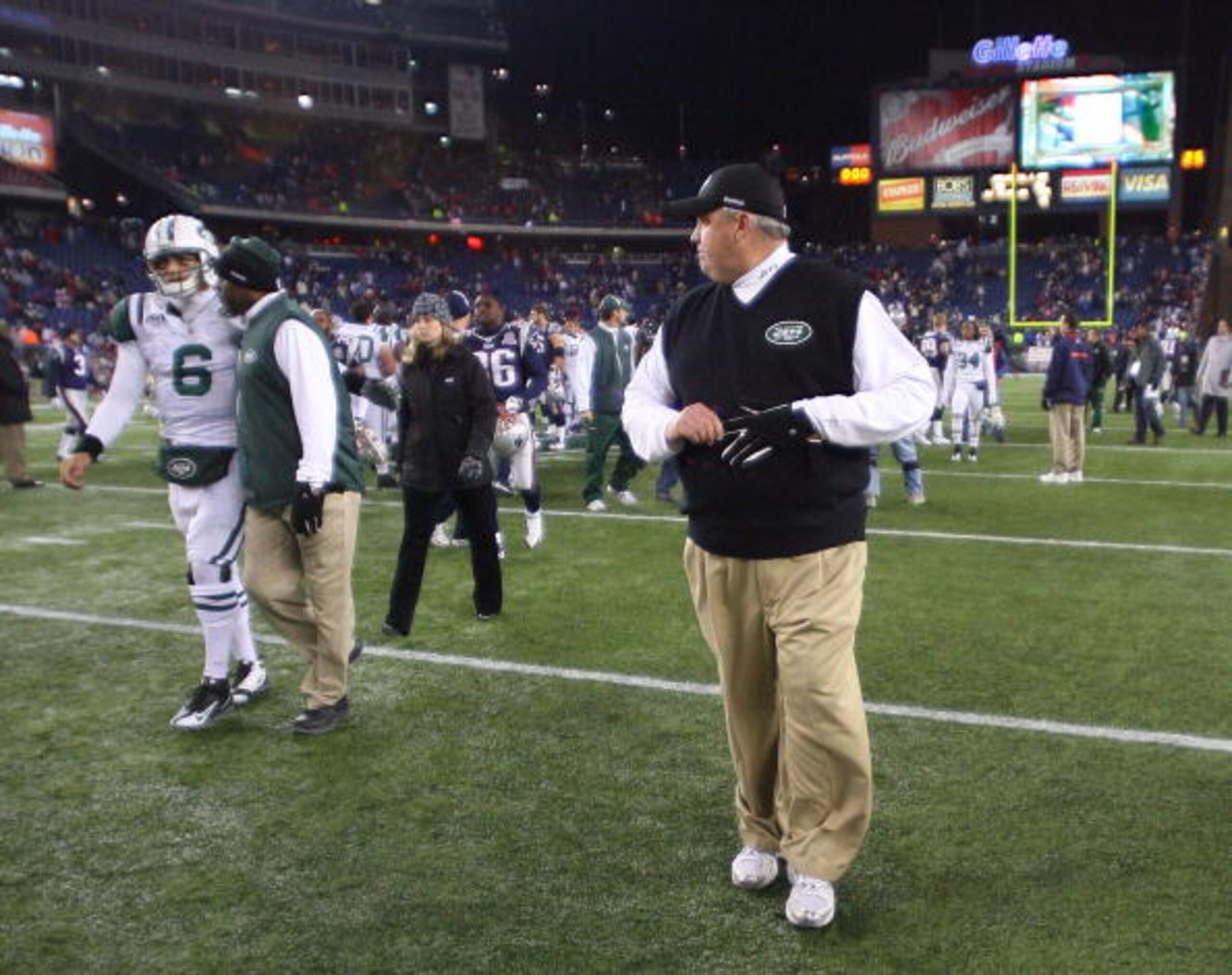 FOXBORO, MA - NOVEMBER 22:  Coach Rex Ryan of the New York Jets looks back at his quarterback Mark Sanchez #6 as they leave the field after losing to the New England Patriots 31-14 on November 22, 2009 in Foxboro, Massachusetts. The Patriots won 31-14. (P
