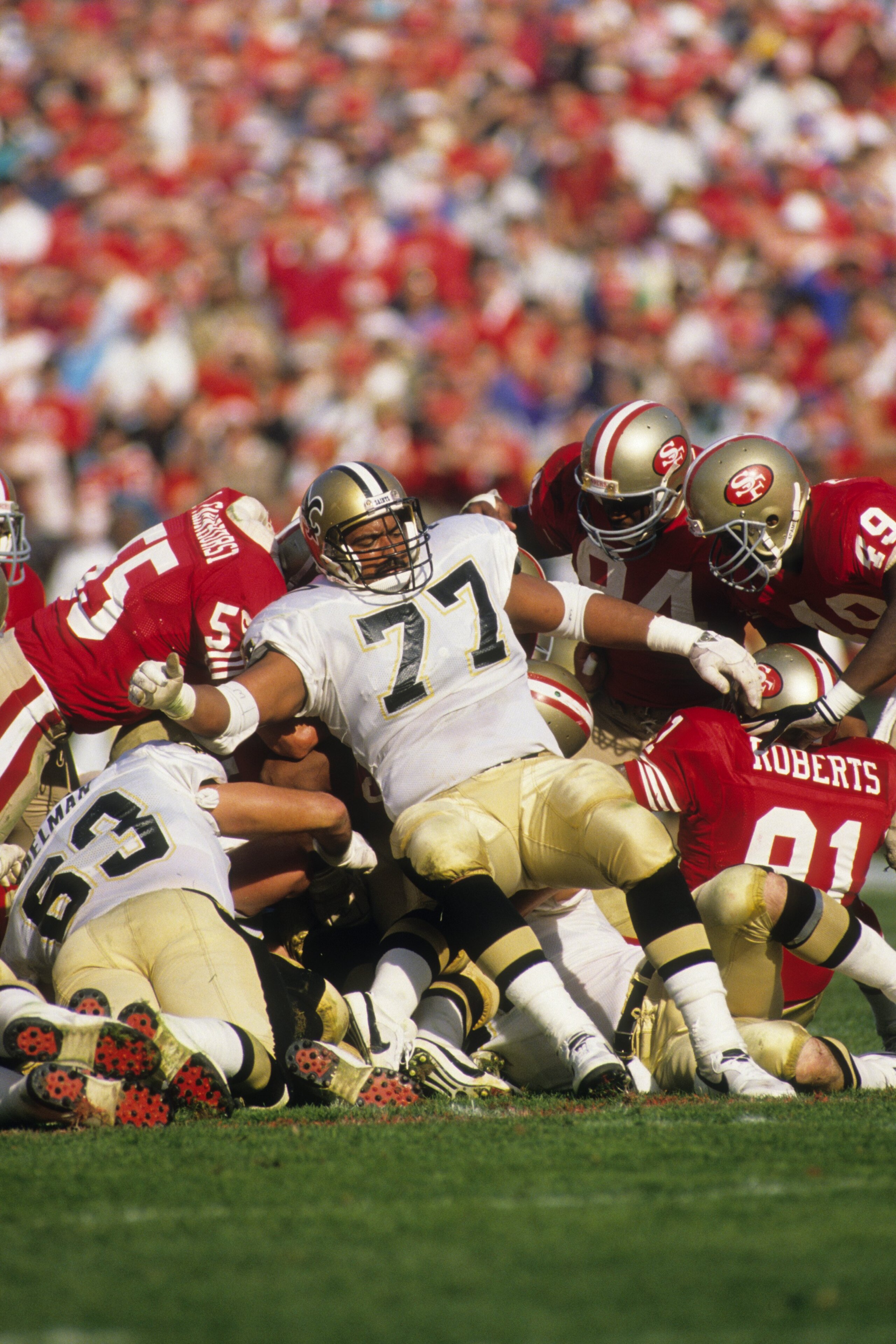 SAN FRANCISCO - DECEMBER 11:  Tackle Daren Gilbert #77 of the New Orleans Saints in action against the San Francisco 49ers during the game at Candlestick Park on December 11, 1988 in San Francisco, California.  The 49ers won 30-17.  (Photo by George Rose/