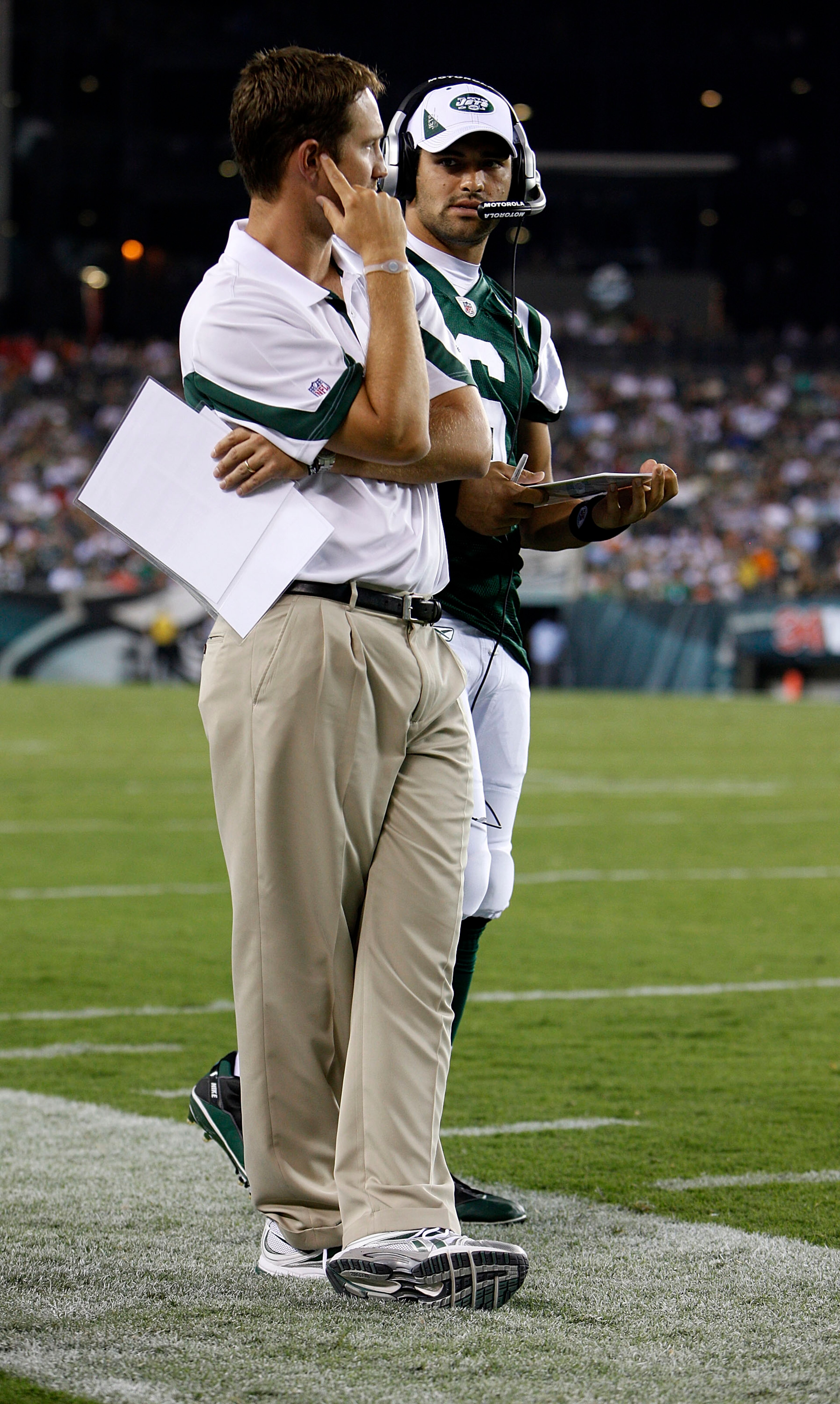 PHILADELPHIA - SEPTEMBER 02: Mark Sanchez #6 and offensive coordinator Brian Schottenheimer of the New York Jets look on during a preseason game against the Philadelphia Eagles at Lincoln Financial Field on September 2, 2010 in Philadelphia, Pennsylvania. PHILADELPHIA - SEPTEMBER 02: Mark Sanchez #6 and offensive coordinator Brian Schottenheimer of the New York Jets look on during a preseason game against the Philadelphia Eagles at Lincoln Financial Field on September 2, 2010 in Philadelphia, Pennsylvania.