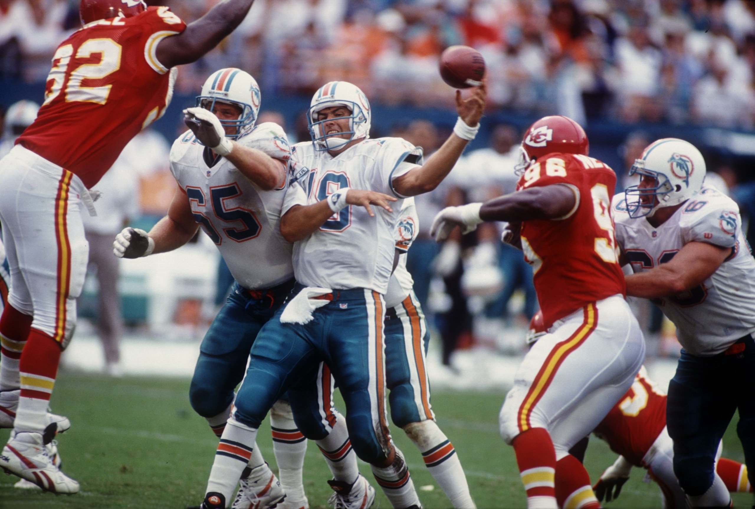 31 Oct 1993: Miami Dolphins quarterback Scott Mitchell manages a pass under heavy pressure during last week''s game against the Kansas City Chiefs. Mitchell is filling in for injured Miami QB Dan Marino, who will be out for the rest of the season.