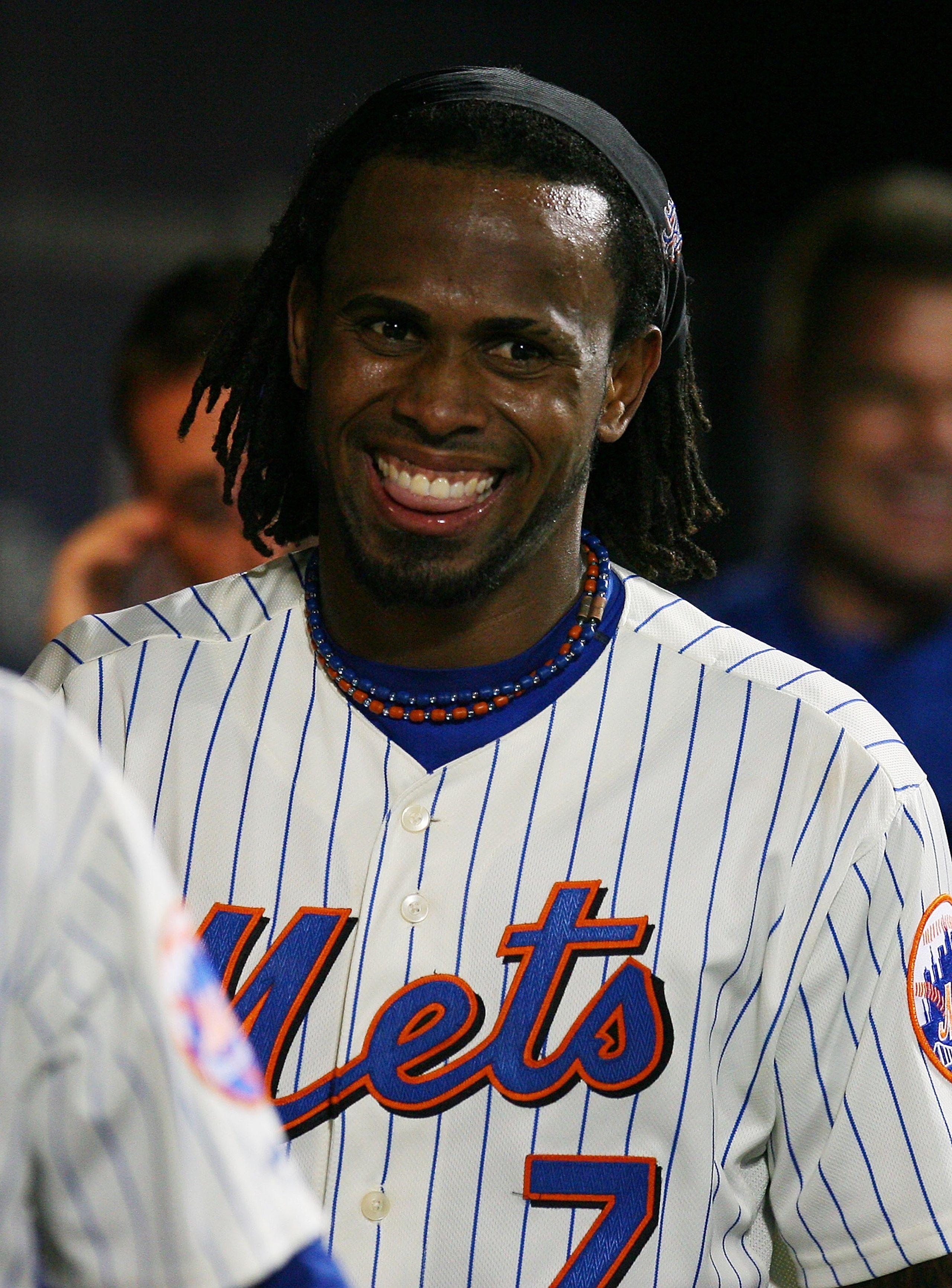 NEW YORK - SEPTEMBER 14:  Jose Reyes #7 of the of the New York Mets celebrates after running in a two-run double hit by teammate Carlos Beltran #15 (not seen) during the fourth inning against Pittsburgh Pirates on September 14, 2010 at Citi Field in the F