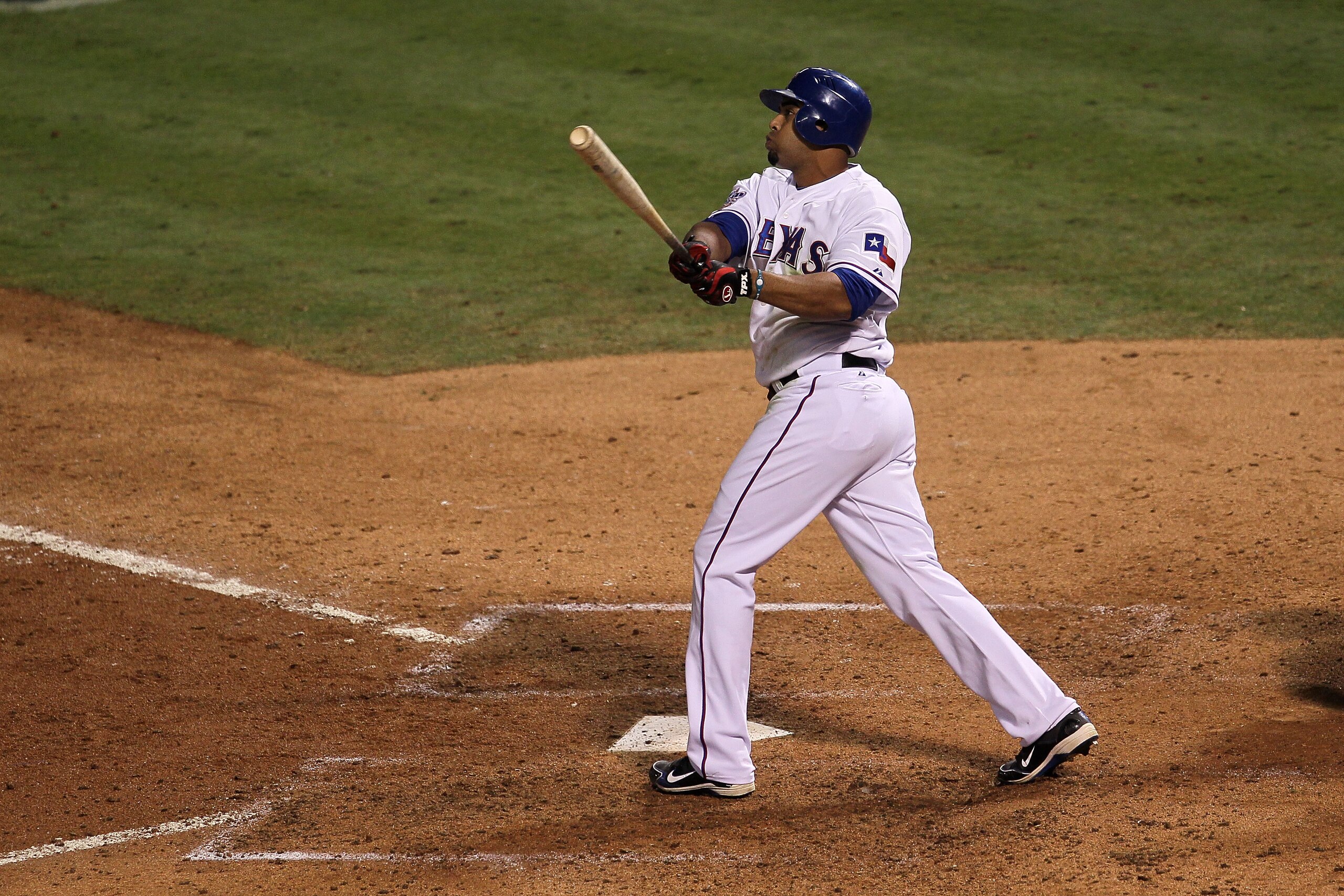 ARLINGTON, TX - NOVEMBER 01:  Nelson Cruz #17 of the Texas Rangers hits a solo home run in the seventh inning against the San Francisco Giants in Game Five of the 2010 MLB World Series at Rangers Ballpark in Arlington on November 1, 2010 in Arlington, Tex