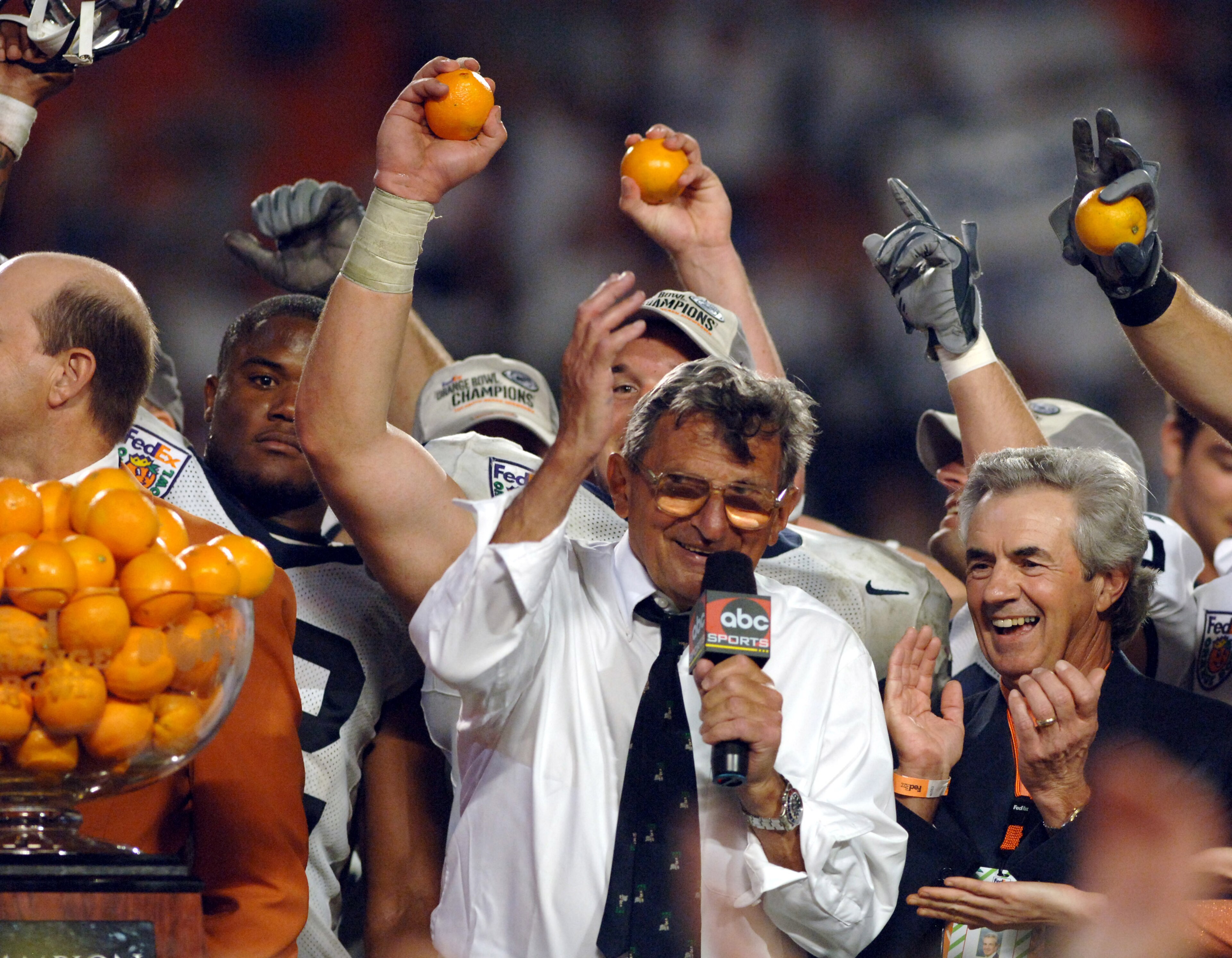 Joe Paterno head Coach of Penn State with the Orange Bowl award at the FedEx Orange Bowl between Penn State and Florida State at Dolphins Stadium in Miami, Florida on January 3, 2006.  (Photo by A. Messerschmidt/Getty Images)