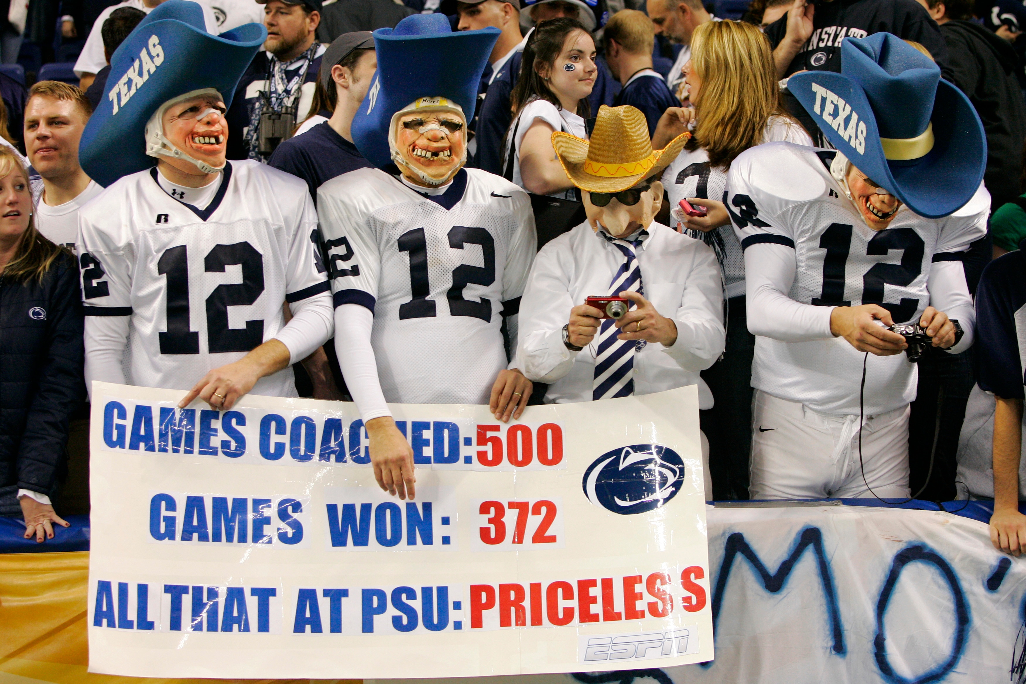SAN ANTONIO - DECEMBER 29:  Penn State Nittany Lions fans dressed as head coach Joe Paterno while poking fun at the Texas A&M Aggies 12th man tradition cheer during the Valero Alamo Bowl on December 29, 2007 at the Alamodome in San Antonio, Texas.  Penn S