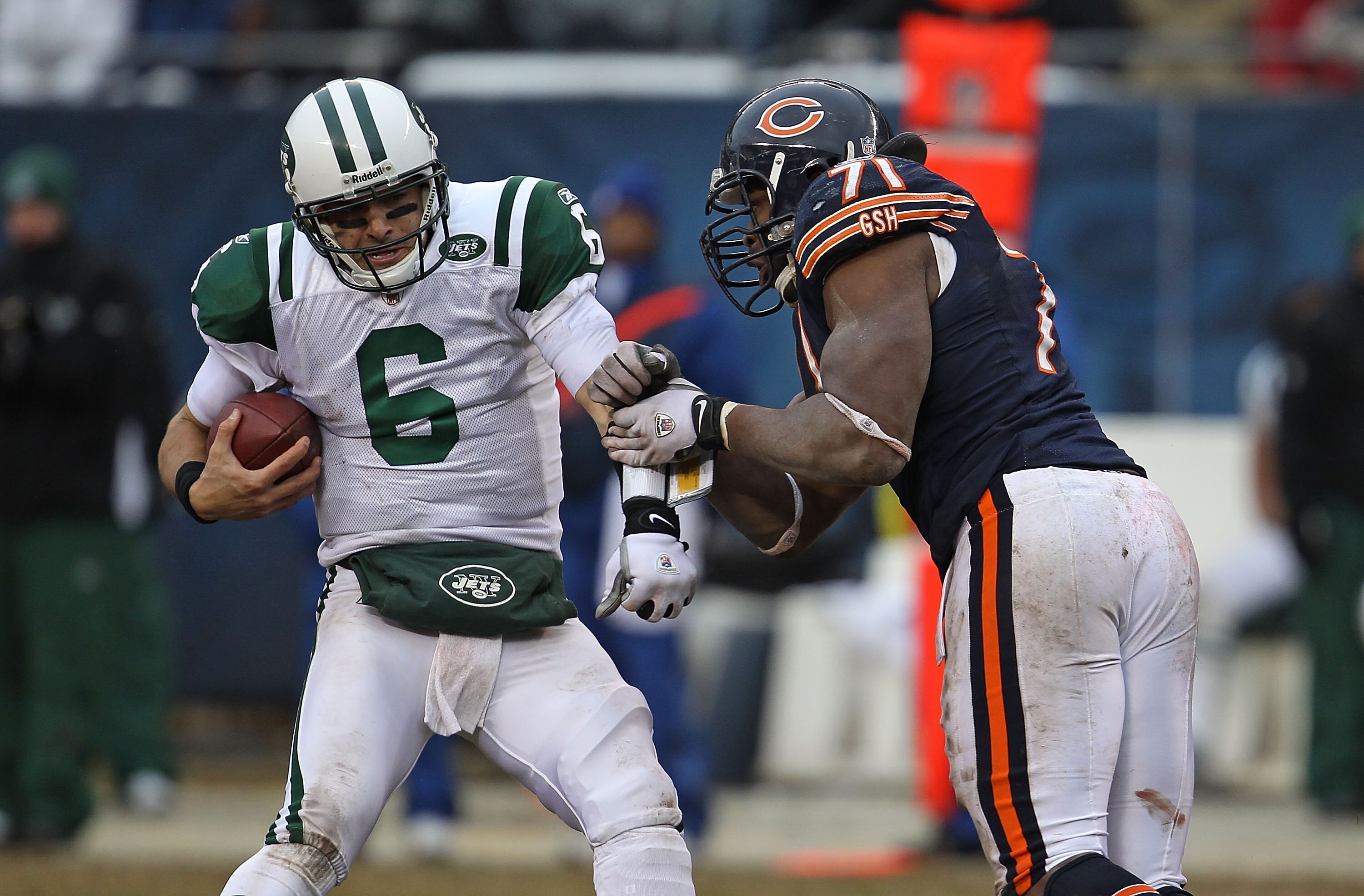 CHICAGO, IL - DECEMBER 26: Mark Sanchez #6 of the New York Jets tries to escape from Israel Idonije #71 of the Chicago Bears at Soldier Field on December 26, 2010 in Chicago, Illinois. The Bears defeated the Jets 38-34. (Photo by Jonathan Daniel/Getty Ima